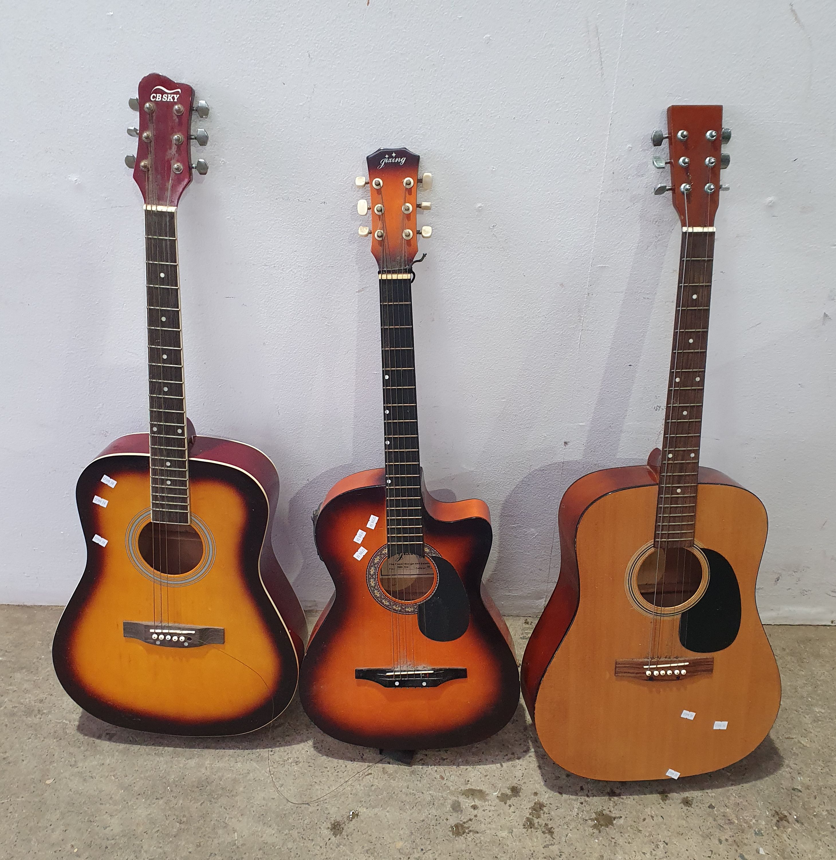 1300 · THREE VARIOUS GUITARS