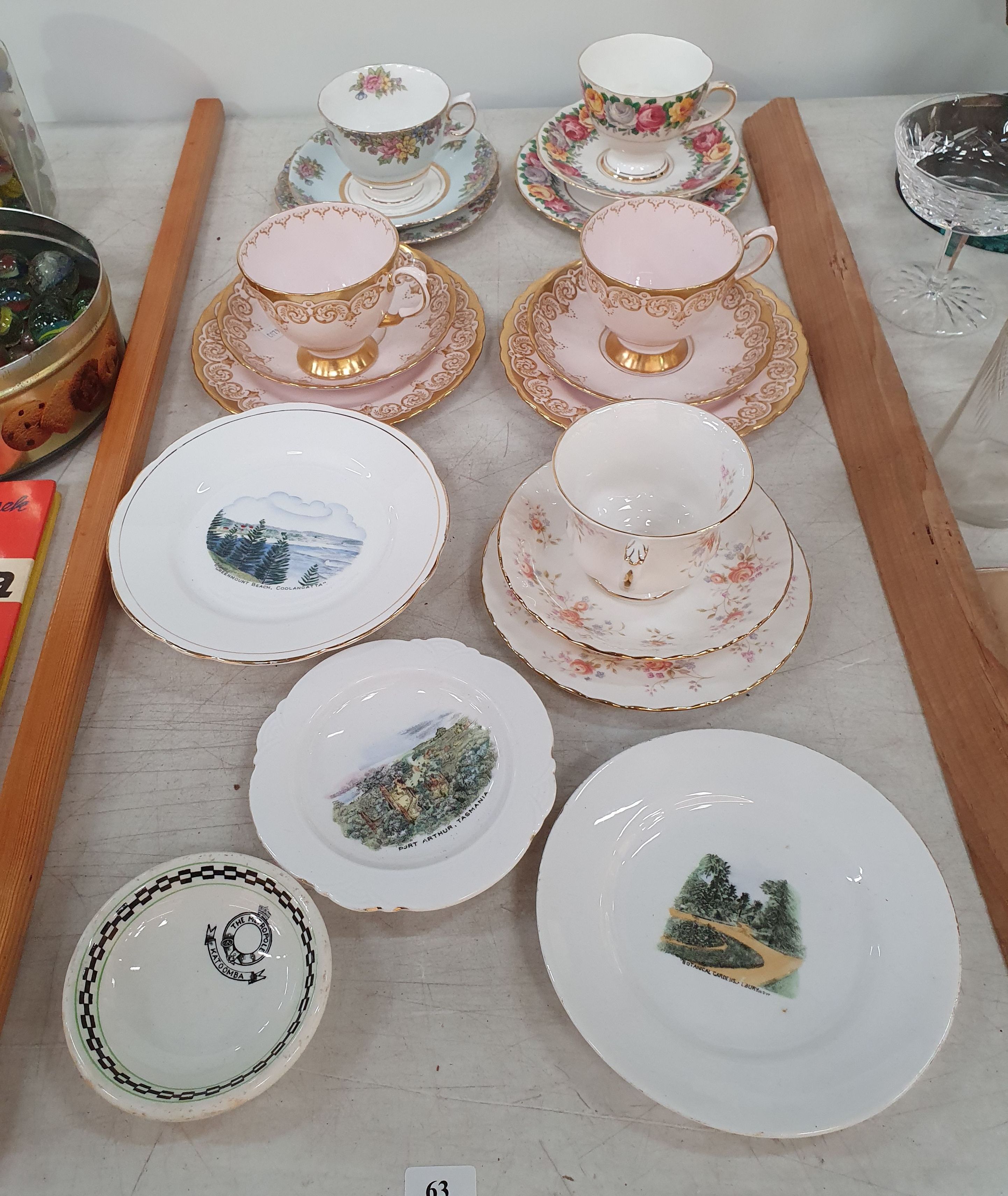 63 · FIVE TRIOS AND VARIOUS VIEW WARE DISHES