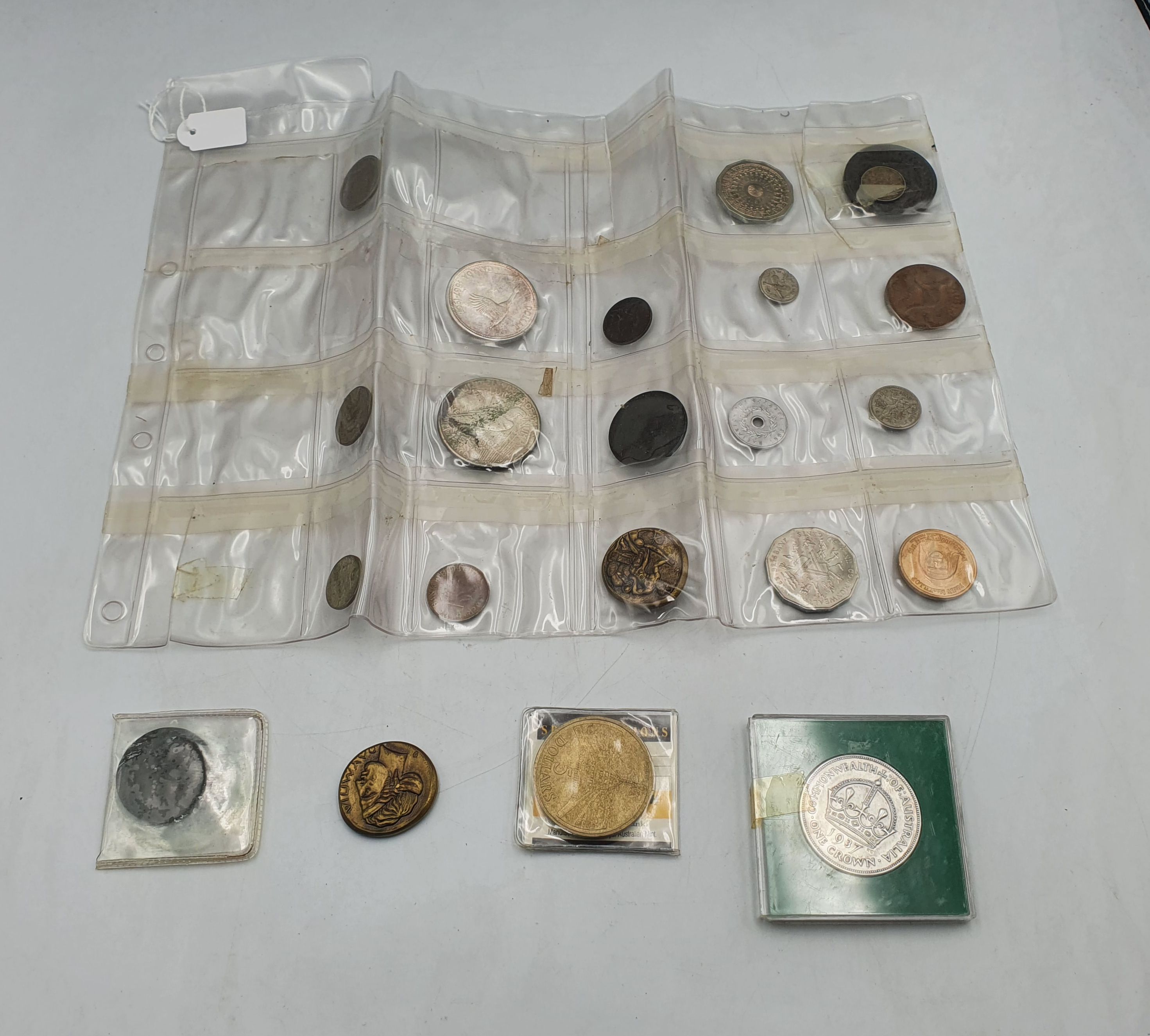 A SMALL QUANTITY OF COINS