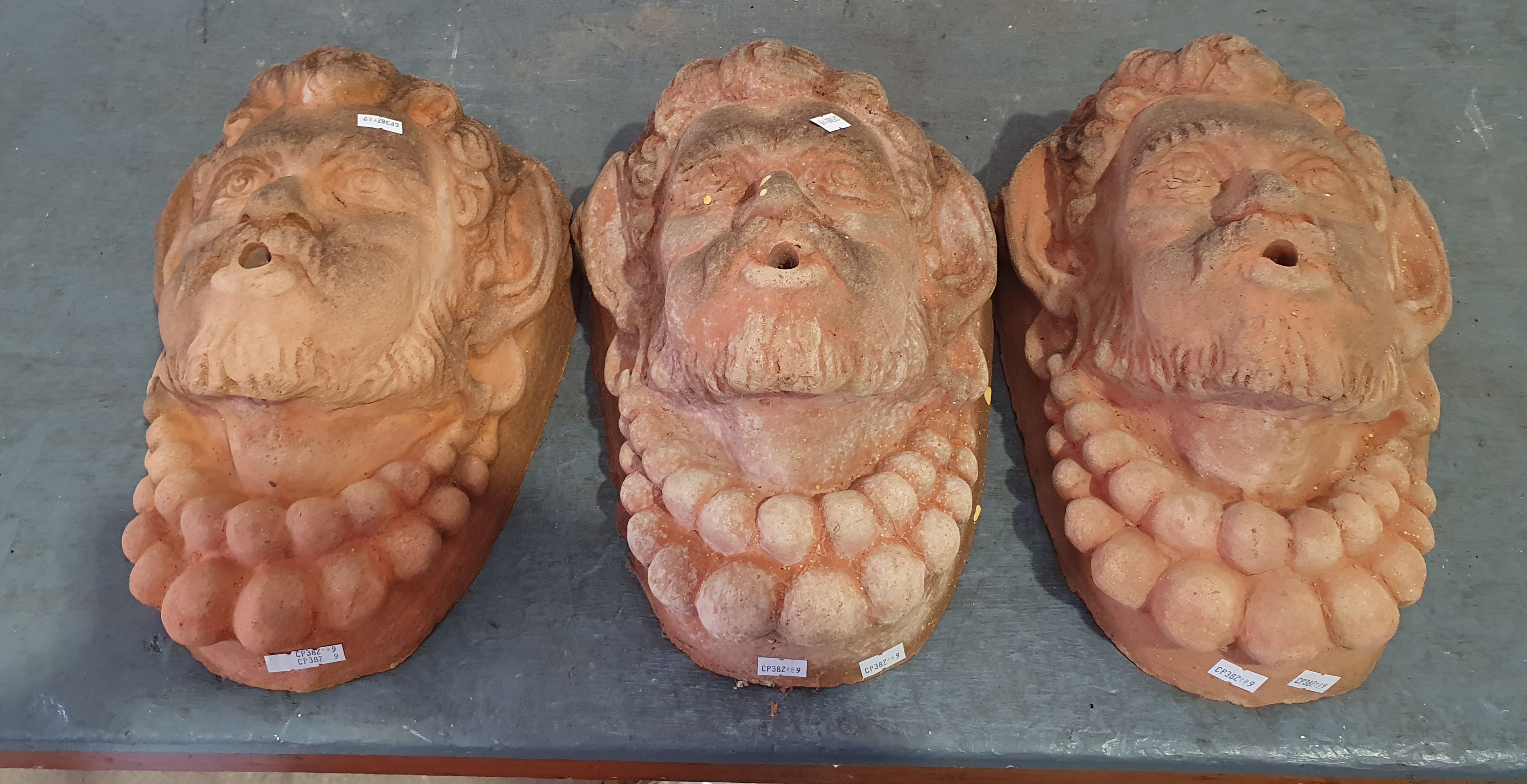 Three Terracotta Fountain Masks