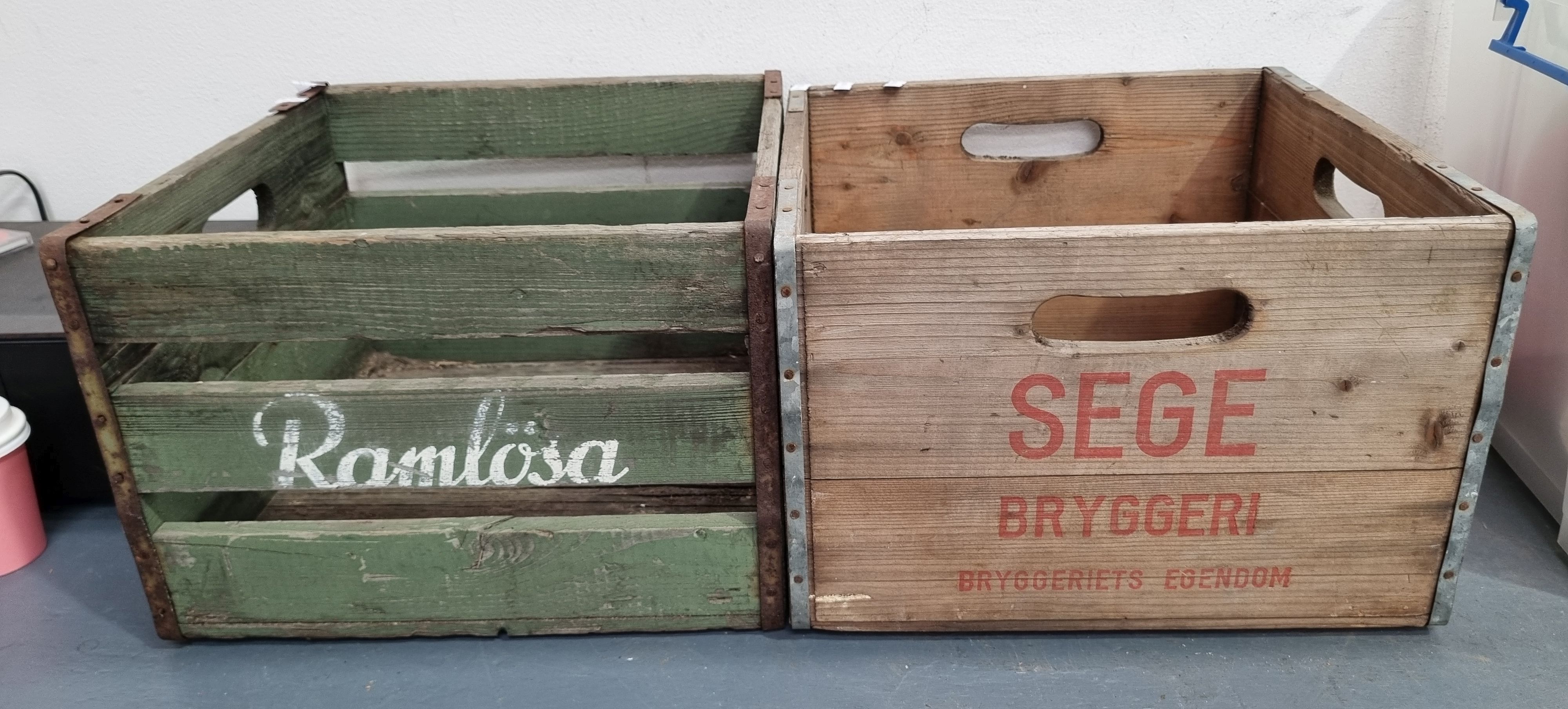 1072 · A PAIR OF WOODEN MILK CRATES
