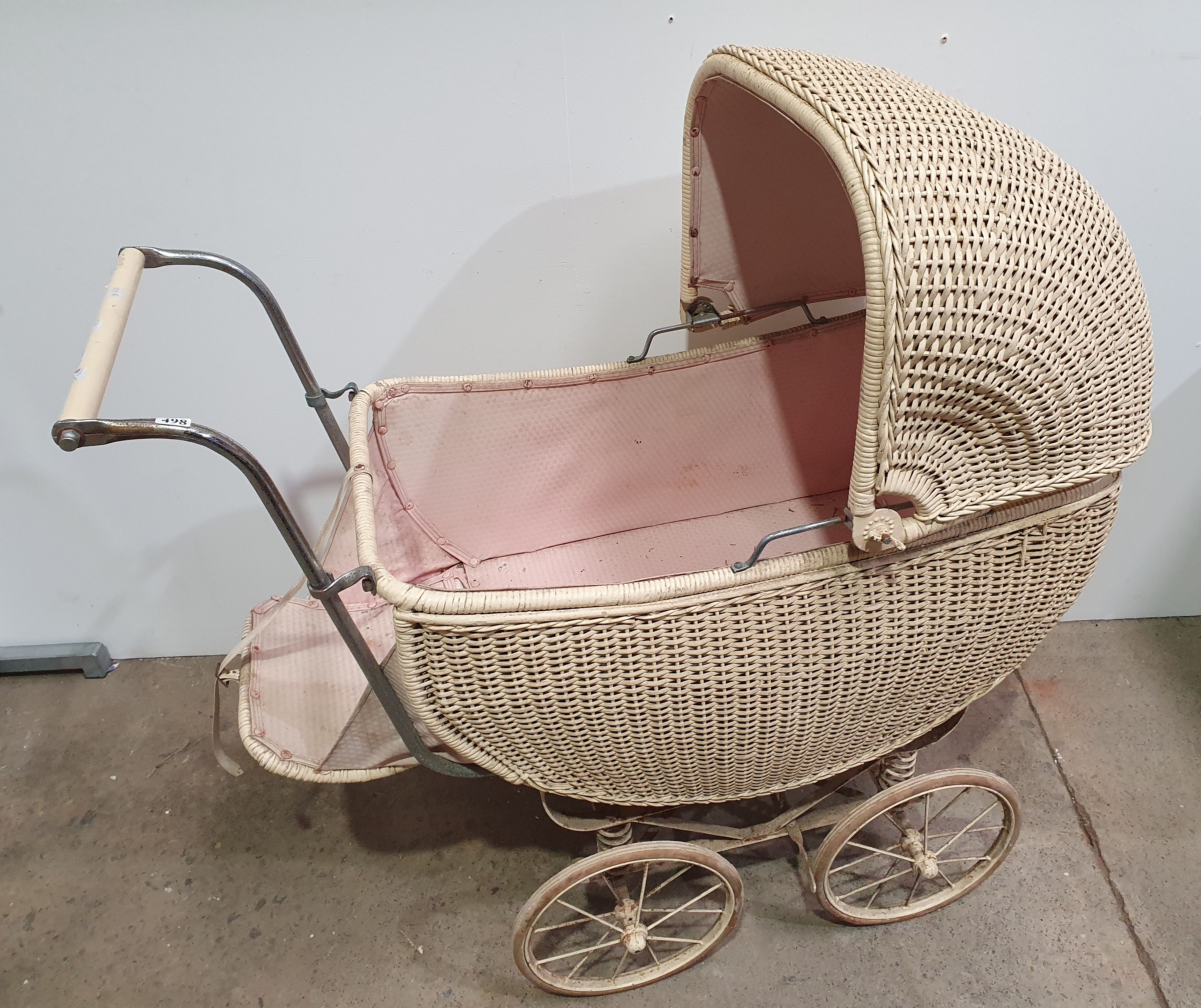 498 · A VINTAGE WICKER PRAM