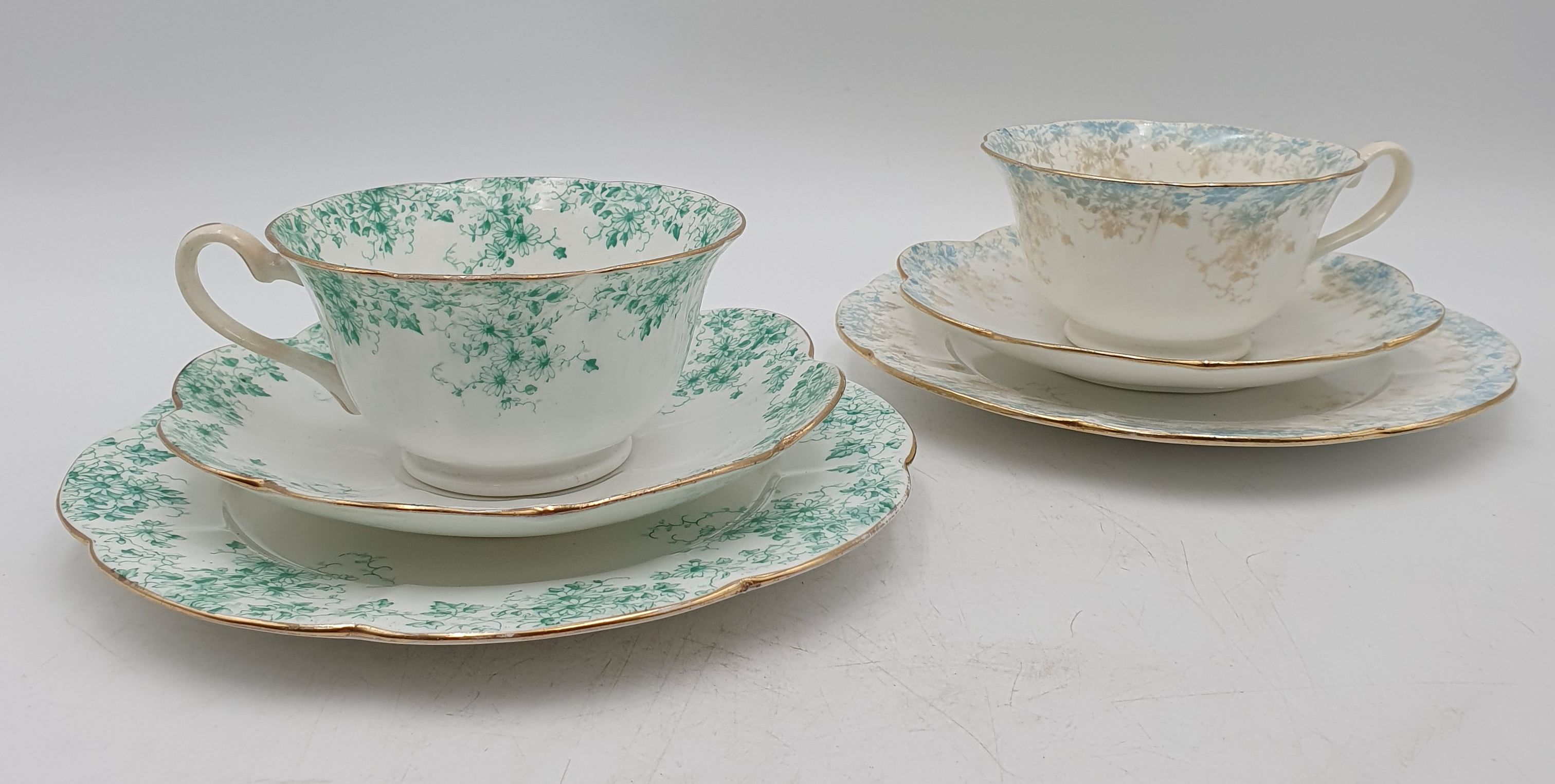517 · TWO WILEMAN & FOLEY TEA TRIOS