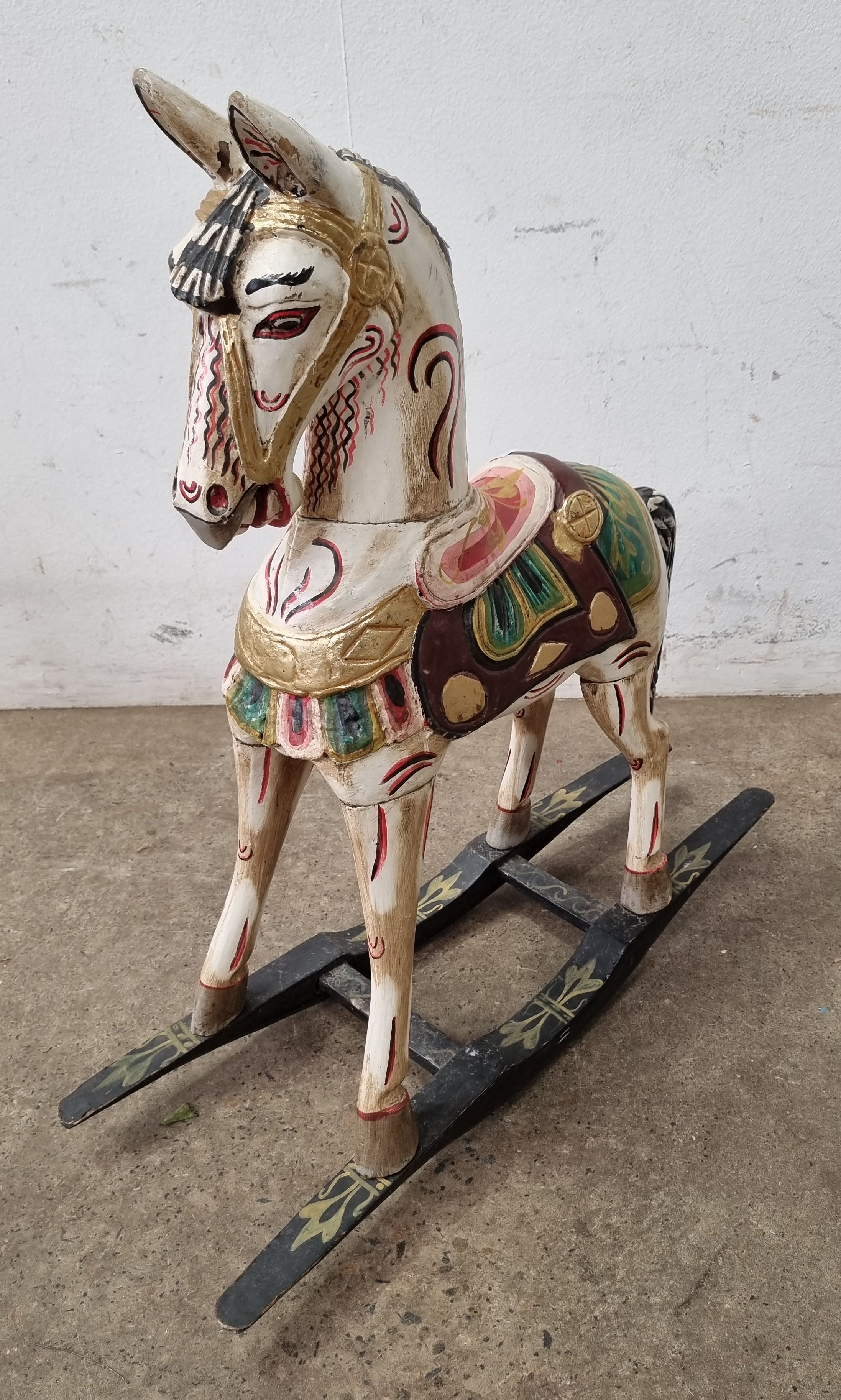A DECORATIVE ROCKING HORSE