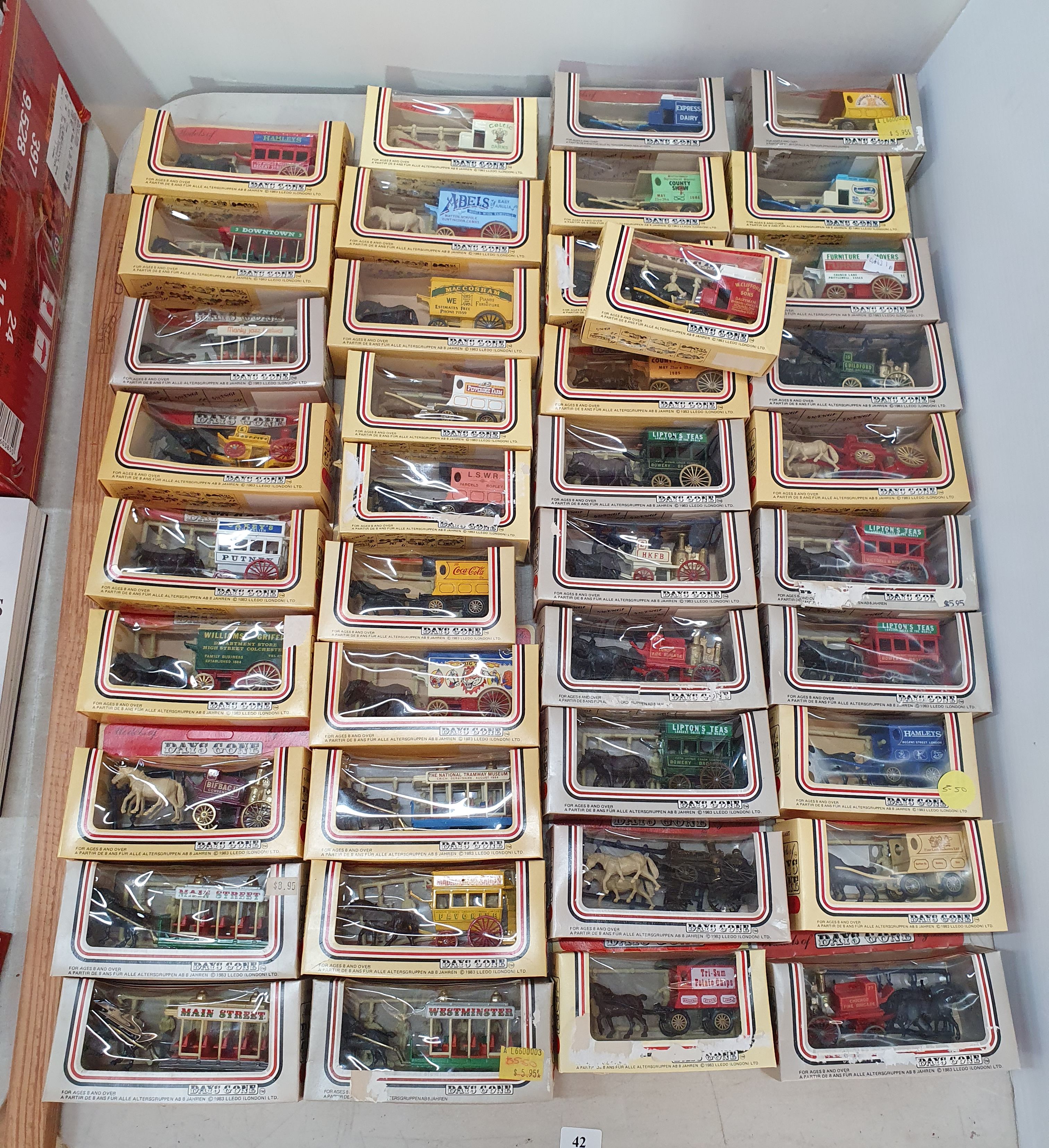 42 · 40 'DAYS GONE' DIE-CAST MODEL DELIVERY HORSE AND CARTS