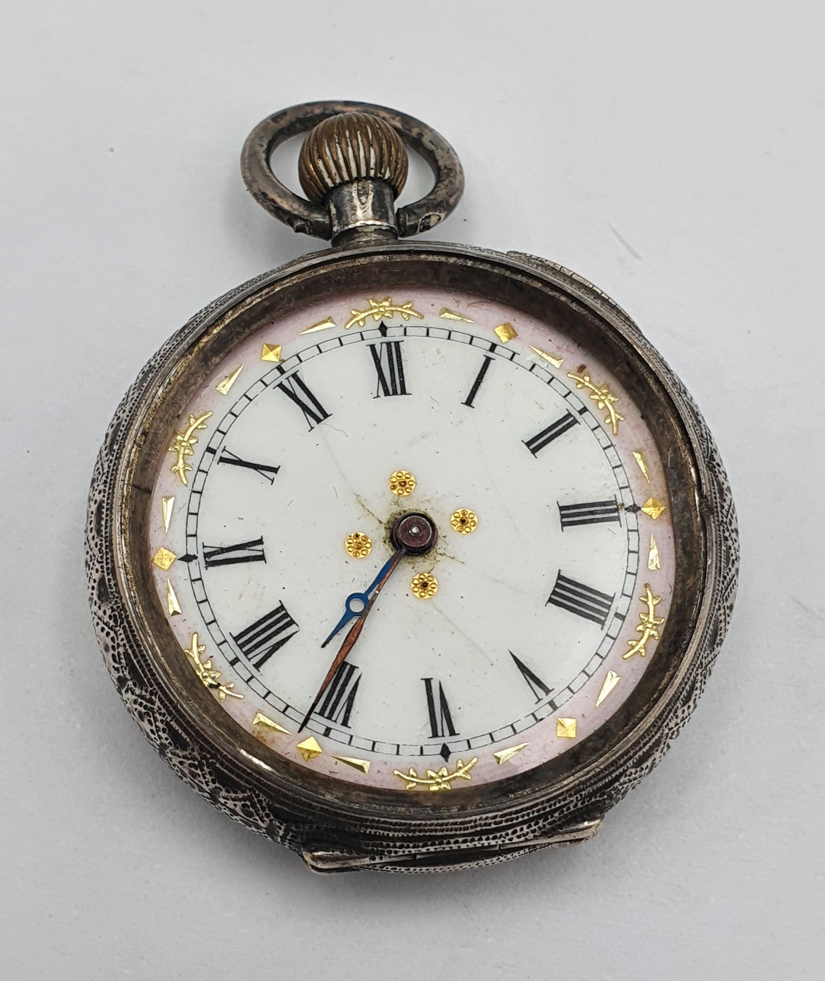 A LADIES SWISS STERLING SILVER OPEN FACED POCKET WATCH