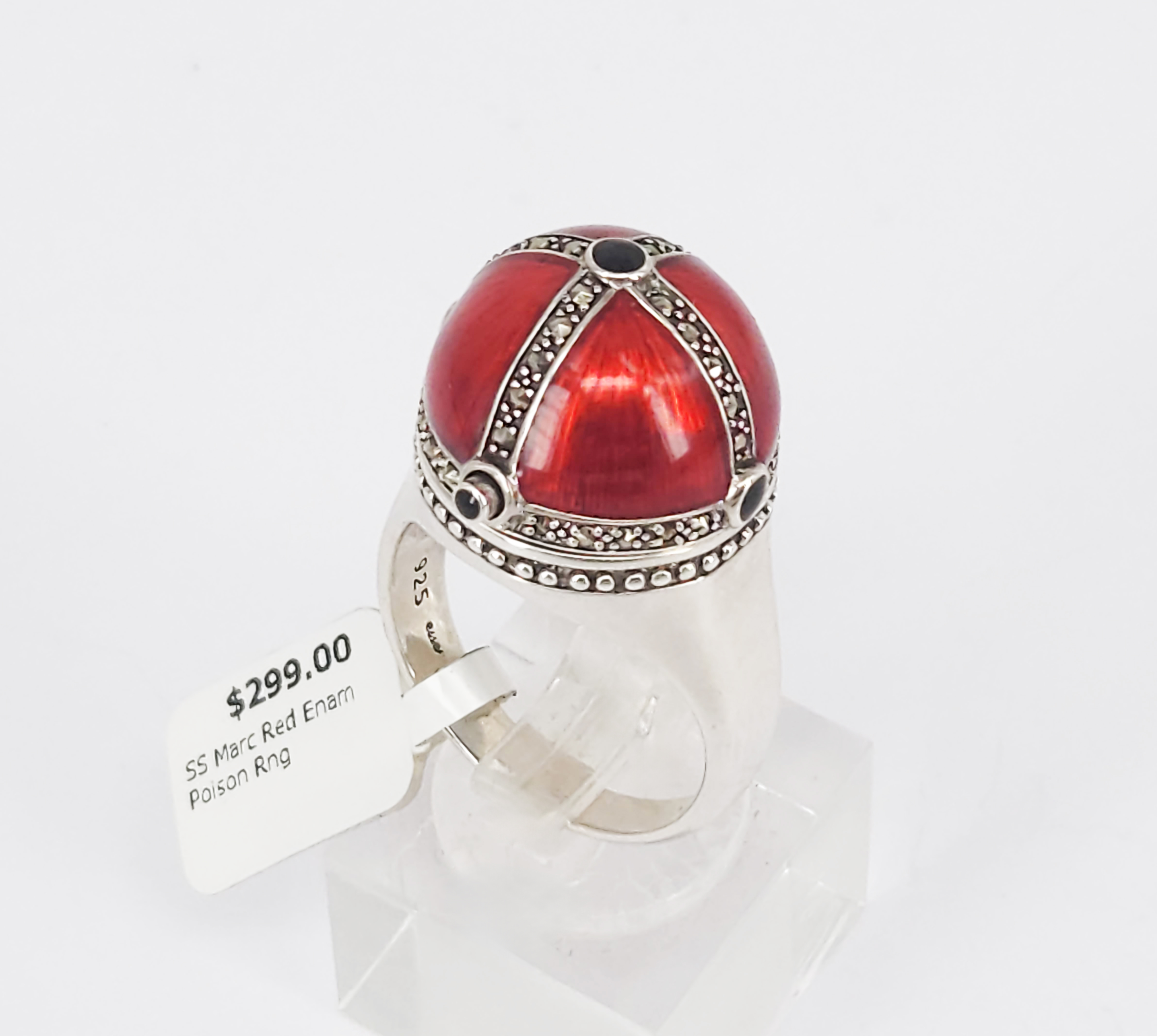 446 · A STERLING SILVER MARCASITE AND RED ENAMEL POISON RING