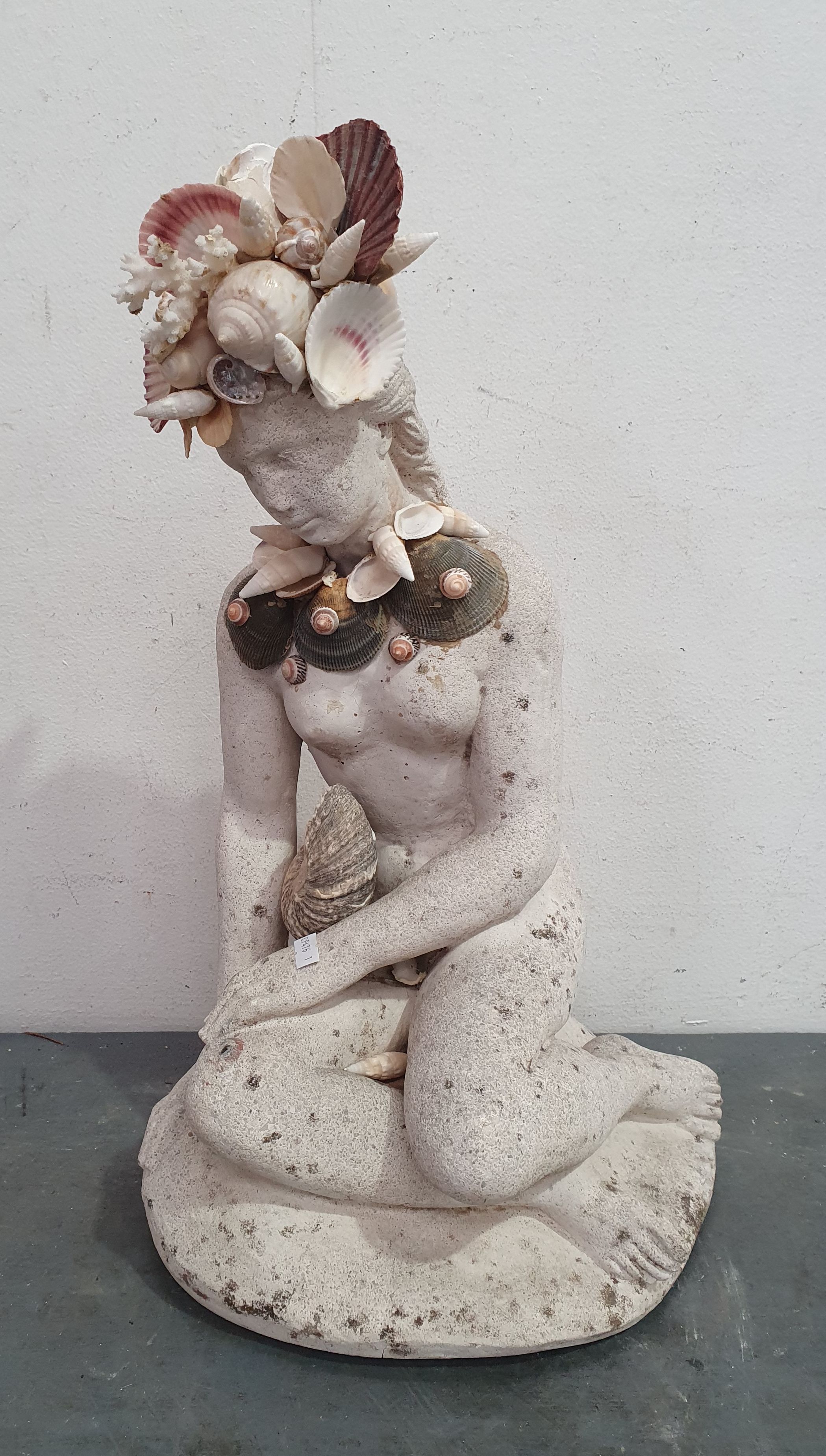 726 · A CONCRETE NYMPH SCULPTURE