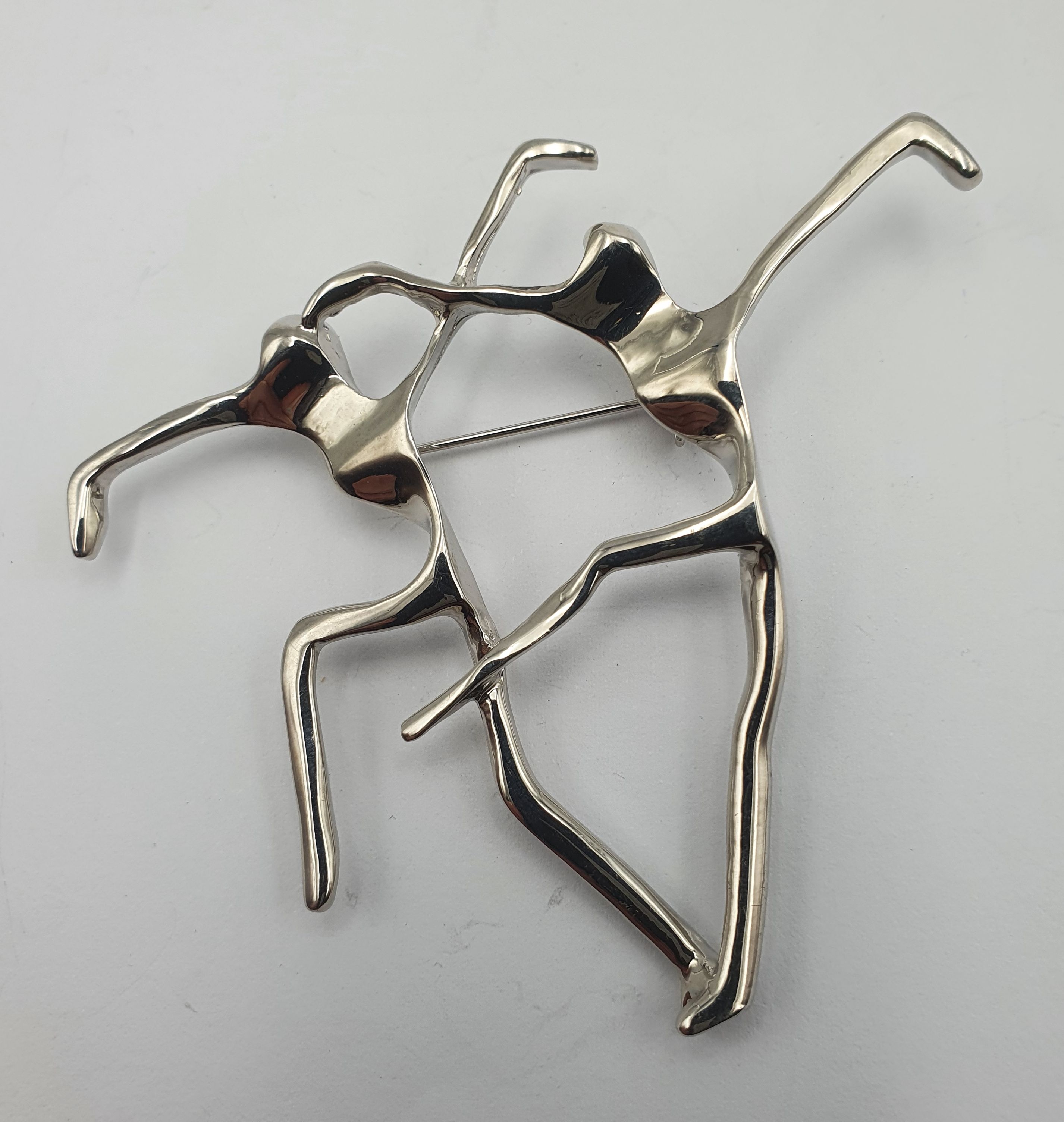 219 · A 'MY SHADOW AND ME' WHITE METAL BROOCH