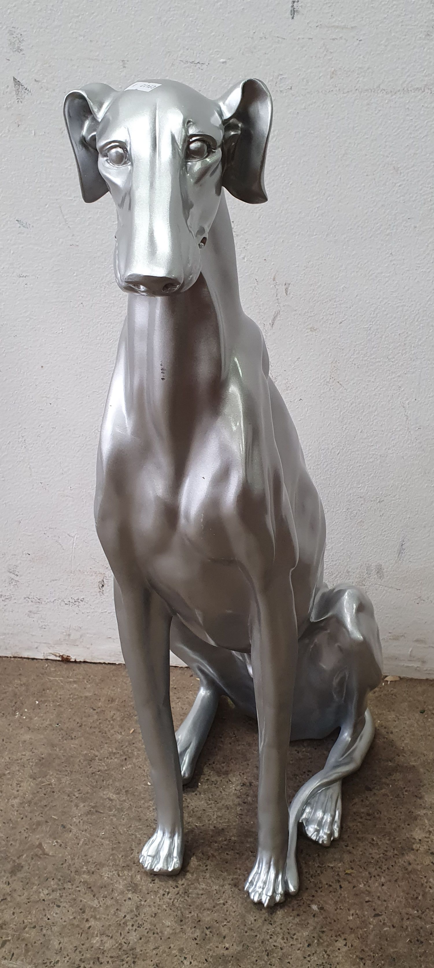 1286 · A RESIN GREYHOUND STATUE