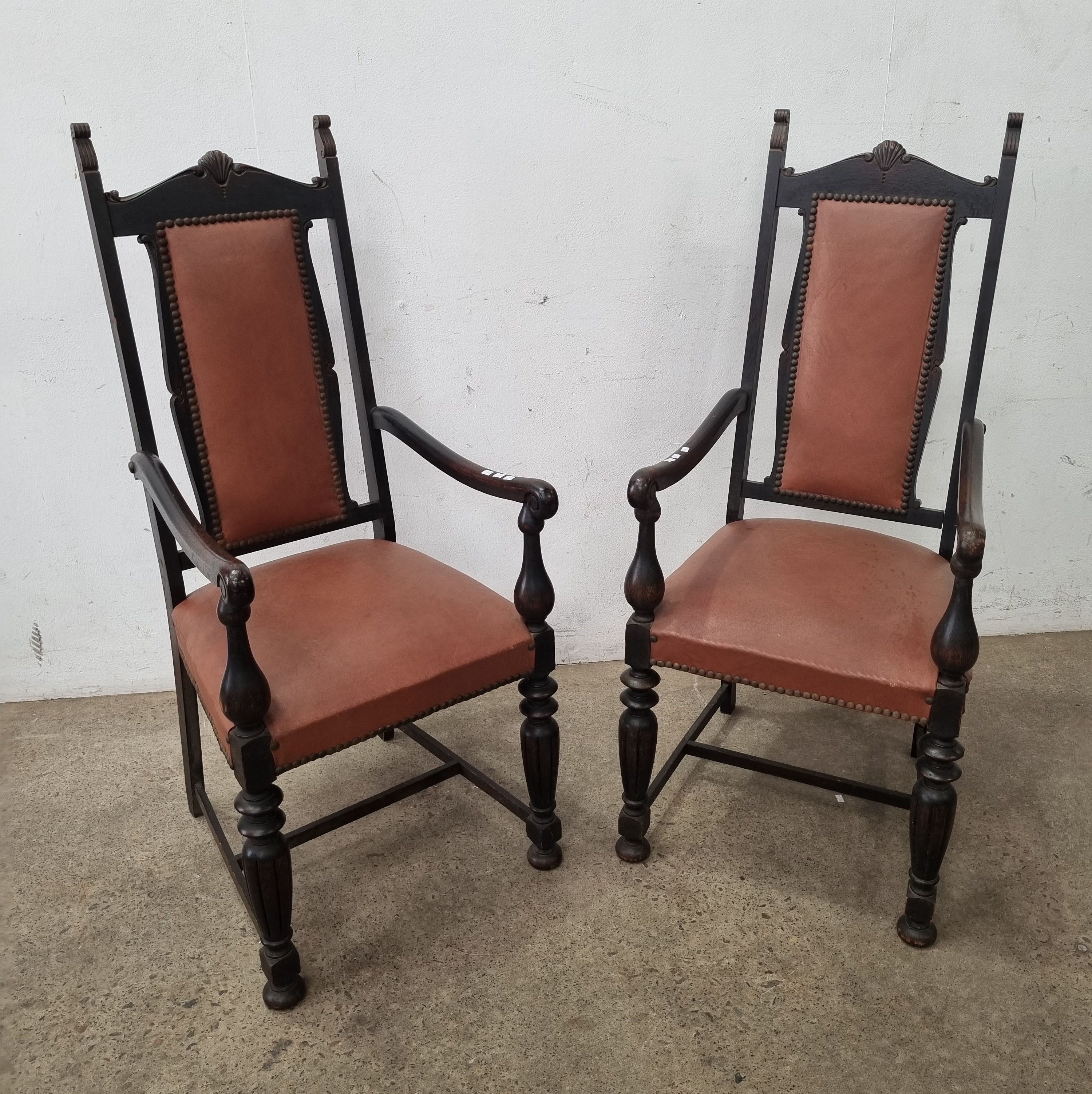 A Pair Of Wooden Armchairs
