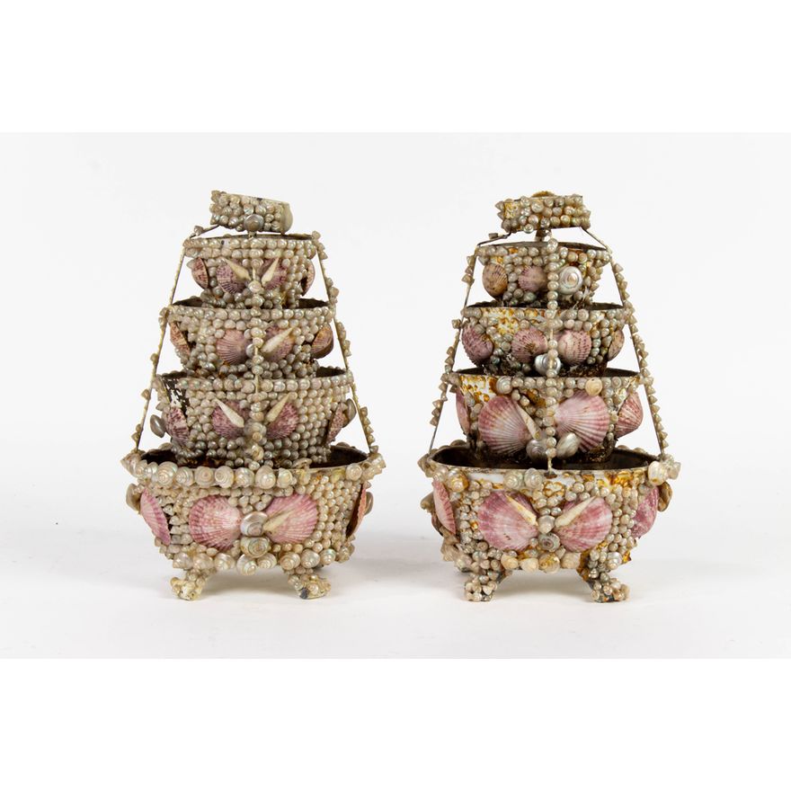A pair of Grotto style shell encrusted tole centerpieces