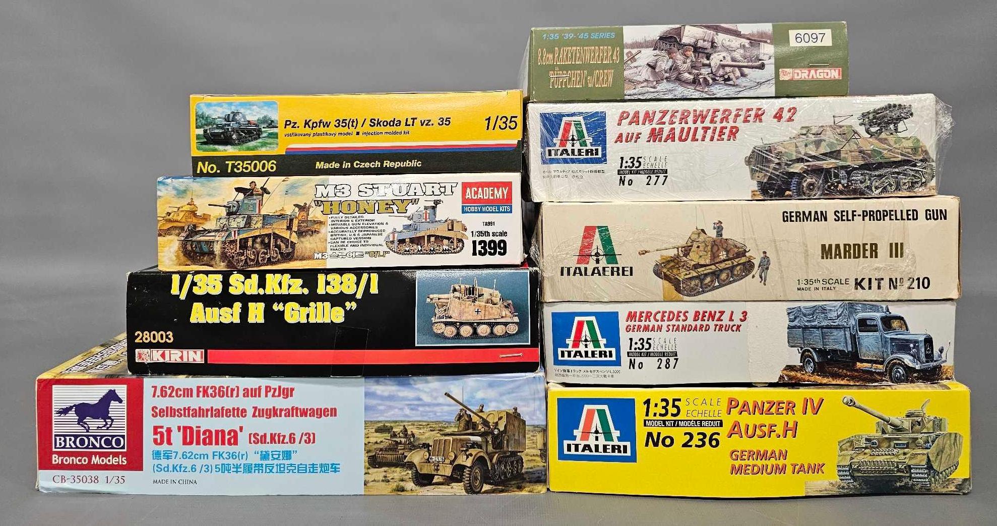 Nine unbuilt 1/35 scale mixed group WWII armor and artillery model