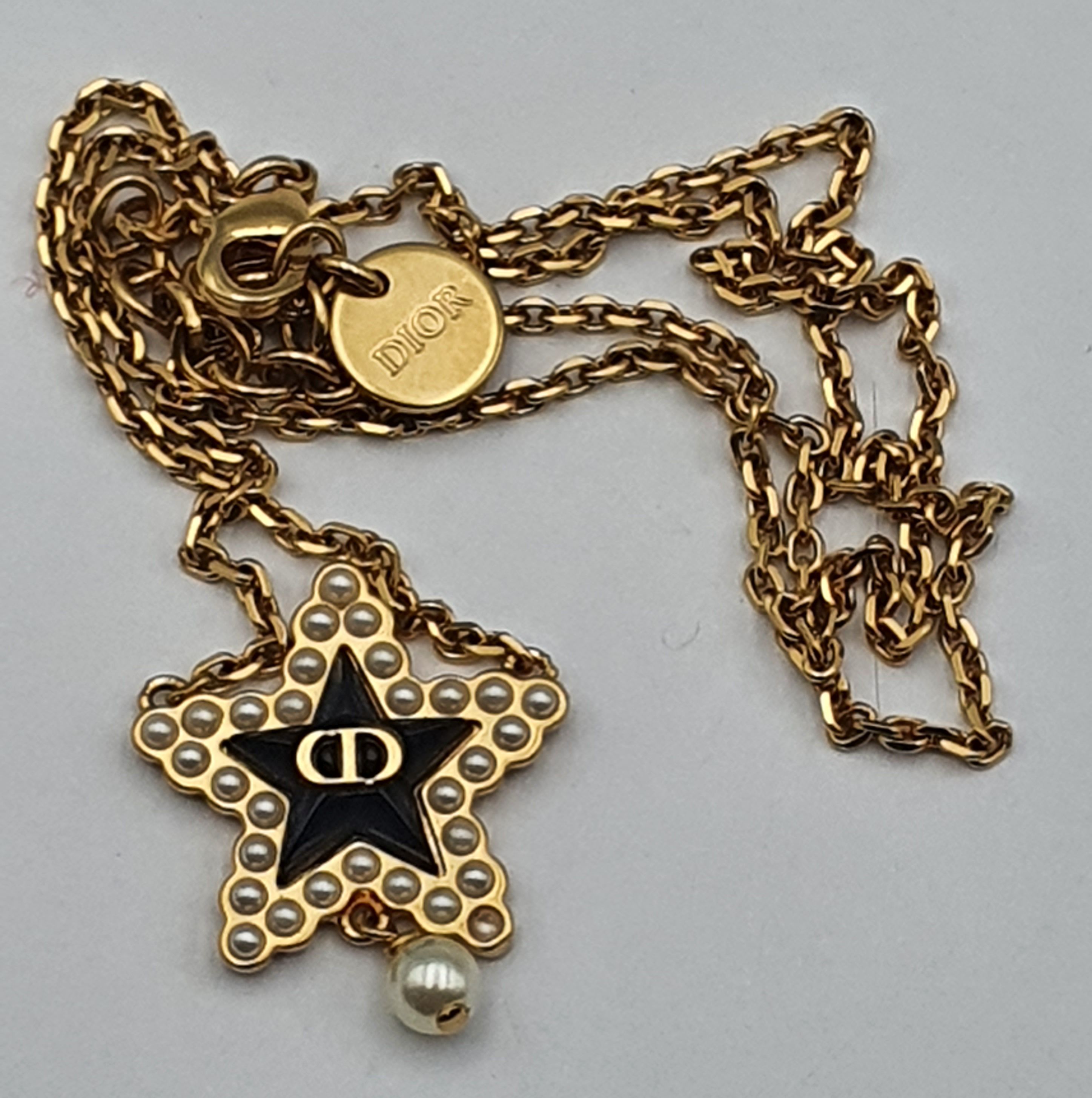 283 · A CHRISTIAN DIOR GOLD PLATED SEED PEARL PENDANT NECKLACE