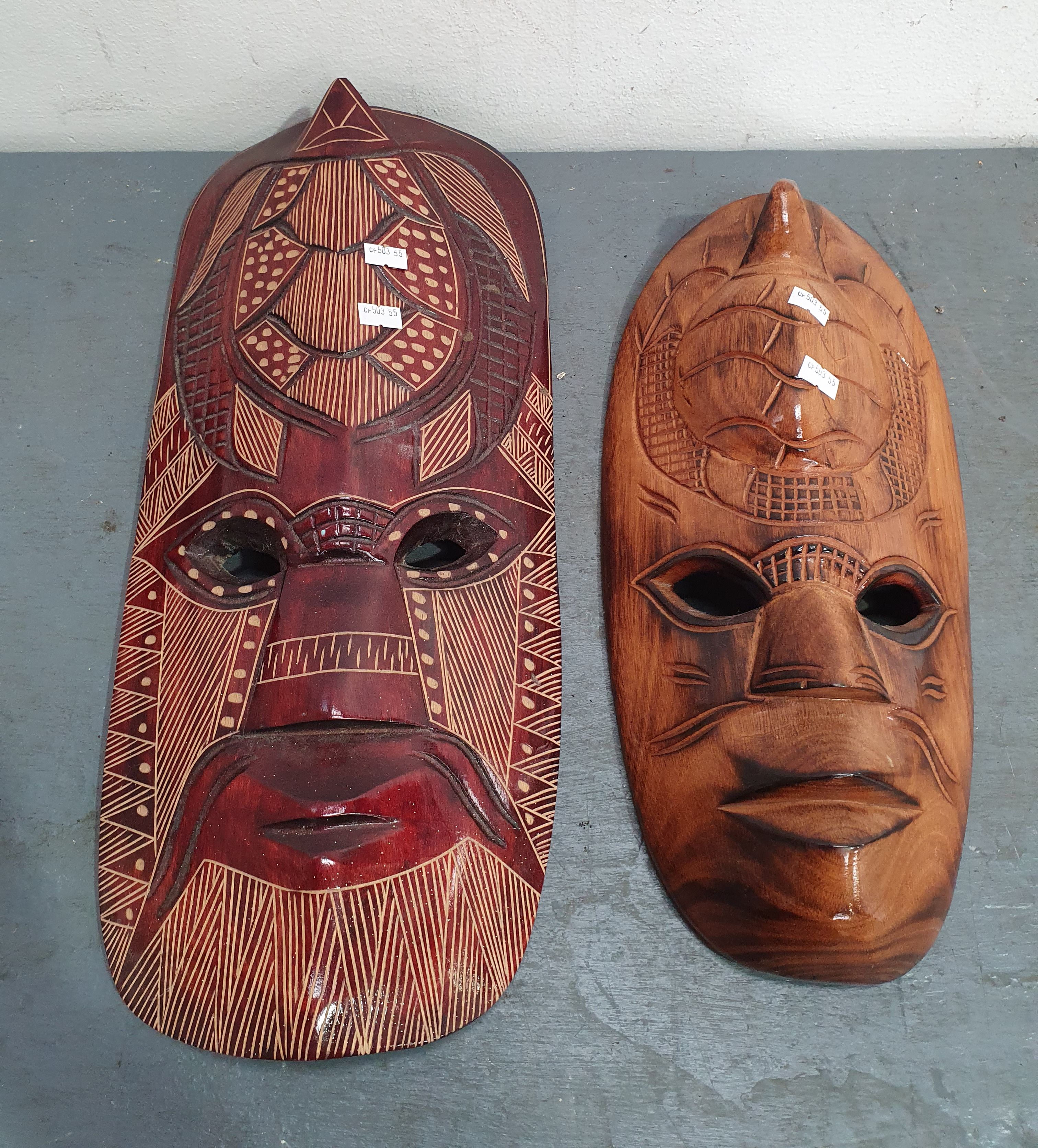 TWO TRIBAL WALL MASKS