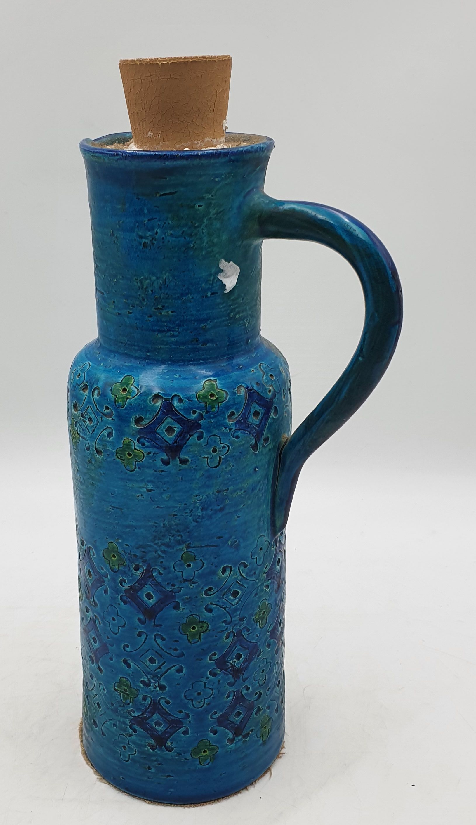 677 · A BITOSSI CERAMIC JUG CONVERTED TO CANDLE HOLDER