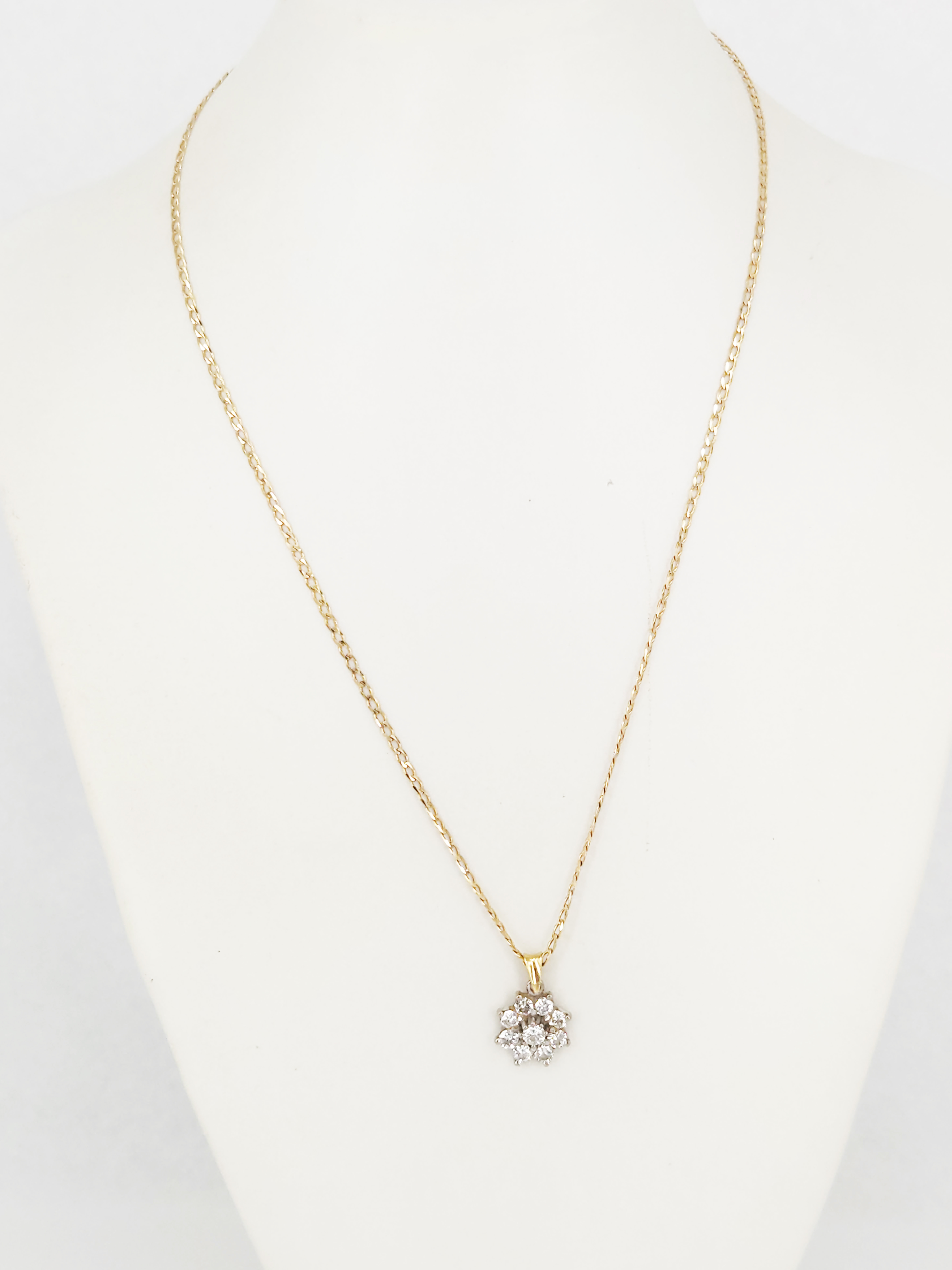 A Diamond Cluster Pendant