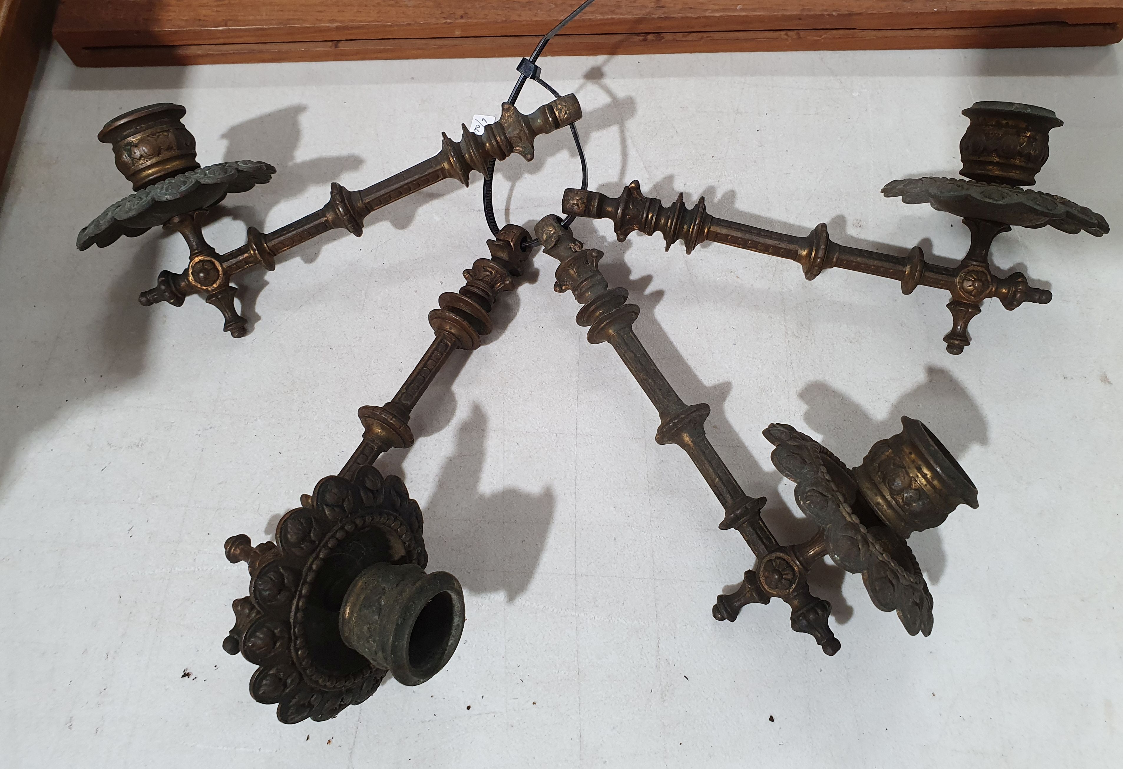 191 · FOUR BRASS CANDLE SCONCES