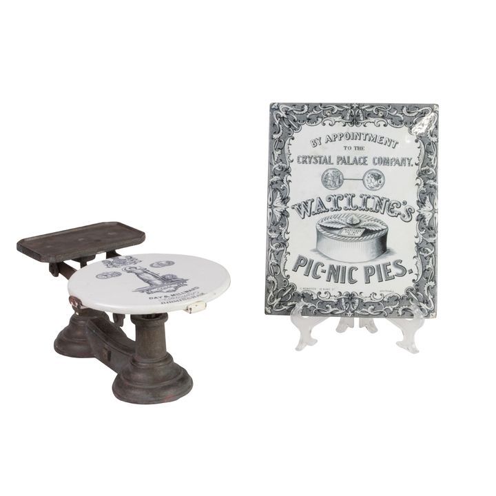 An English ironstone advertising sign and scale