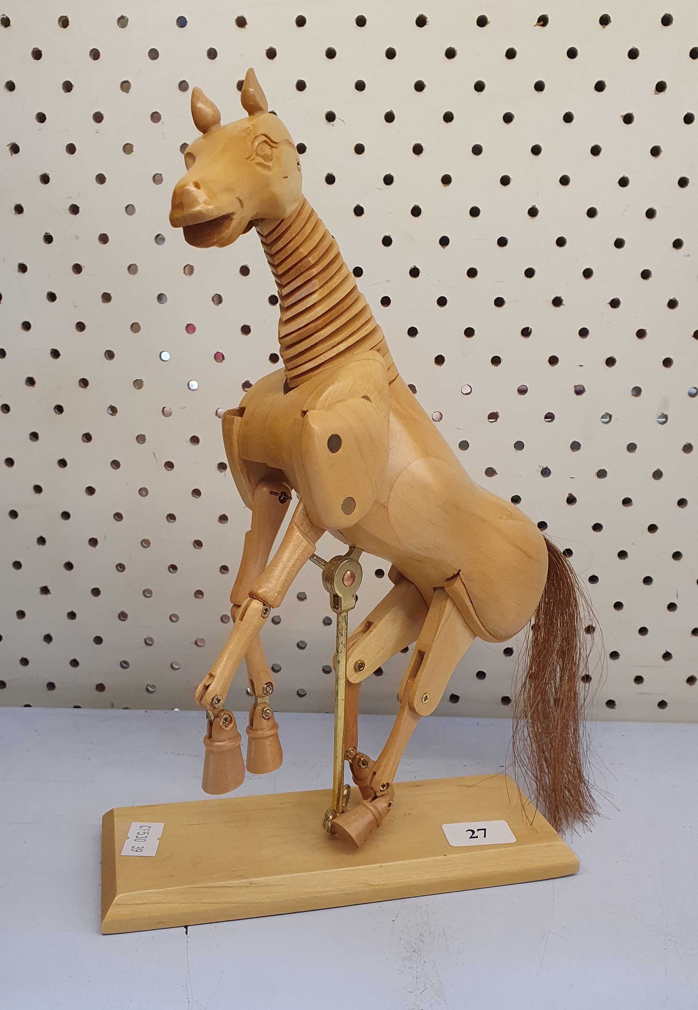 27 · AN ARTICULATED WOODEN ARTIST'S HORSE FIGURE
