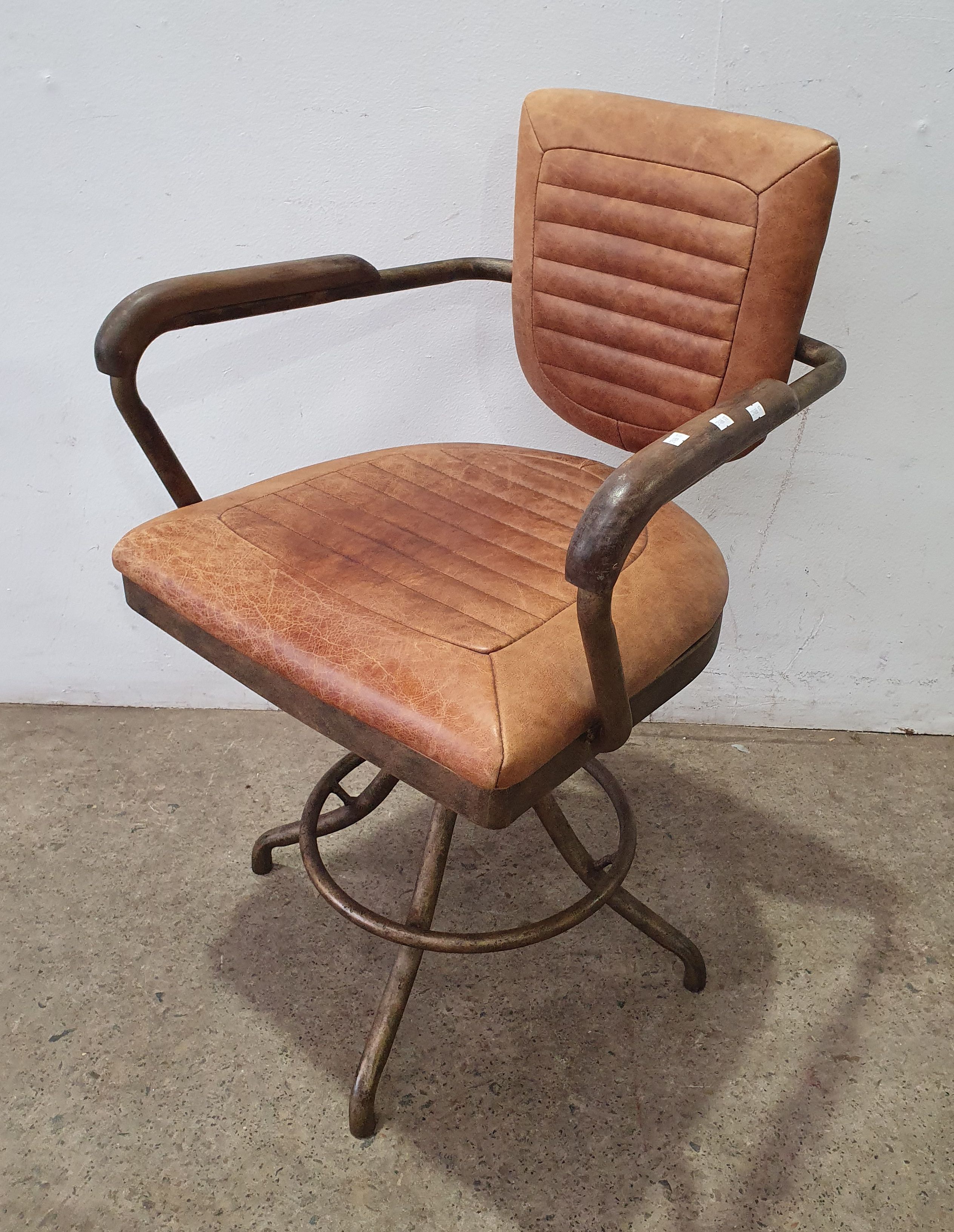 An Industrial Style Metal Swivel Office Chair