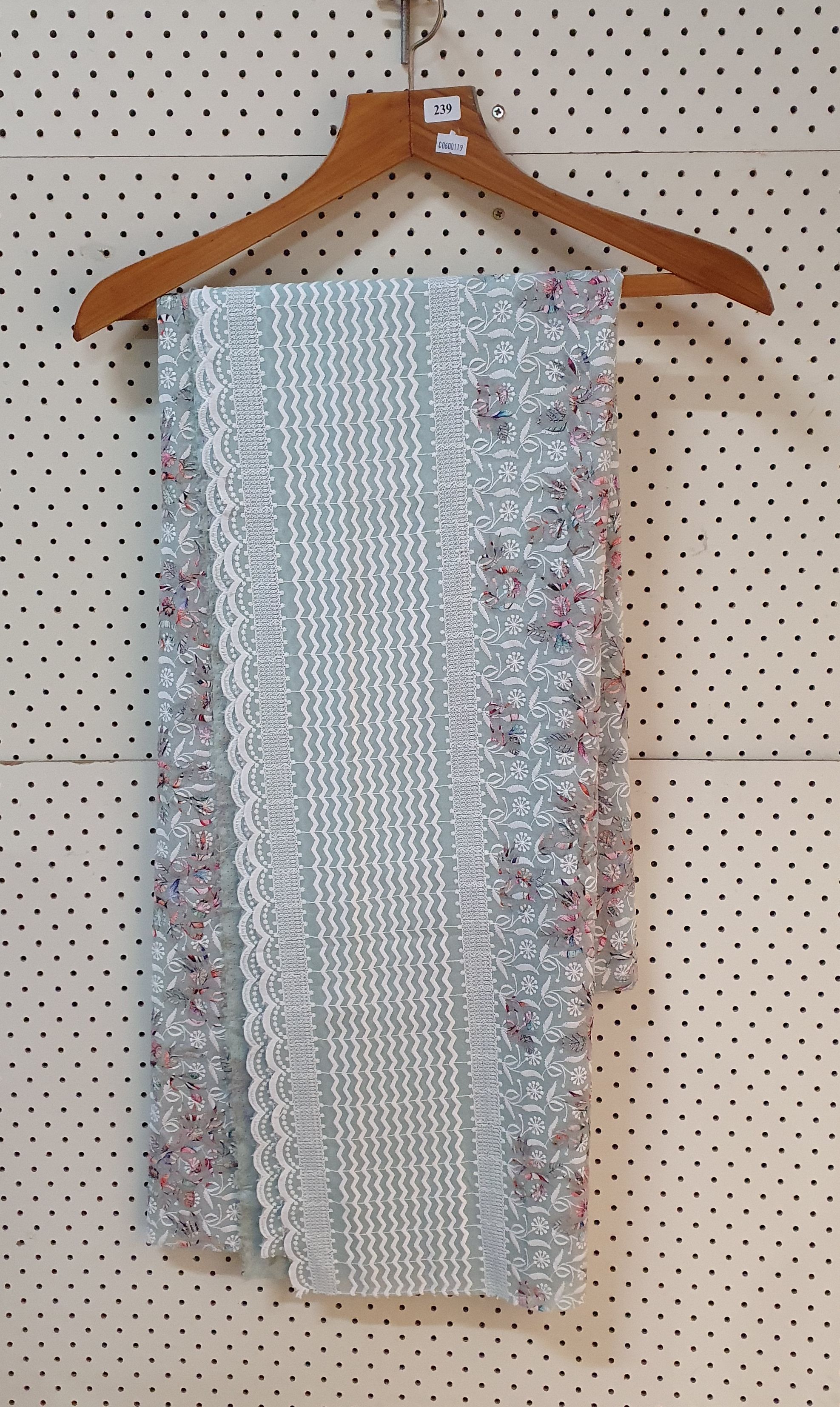 A LENGTH OF EMBORIDERED FABRIC