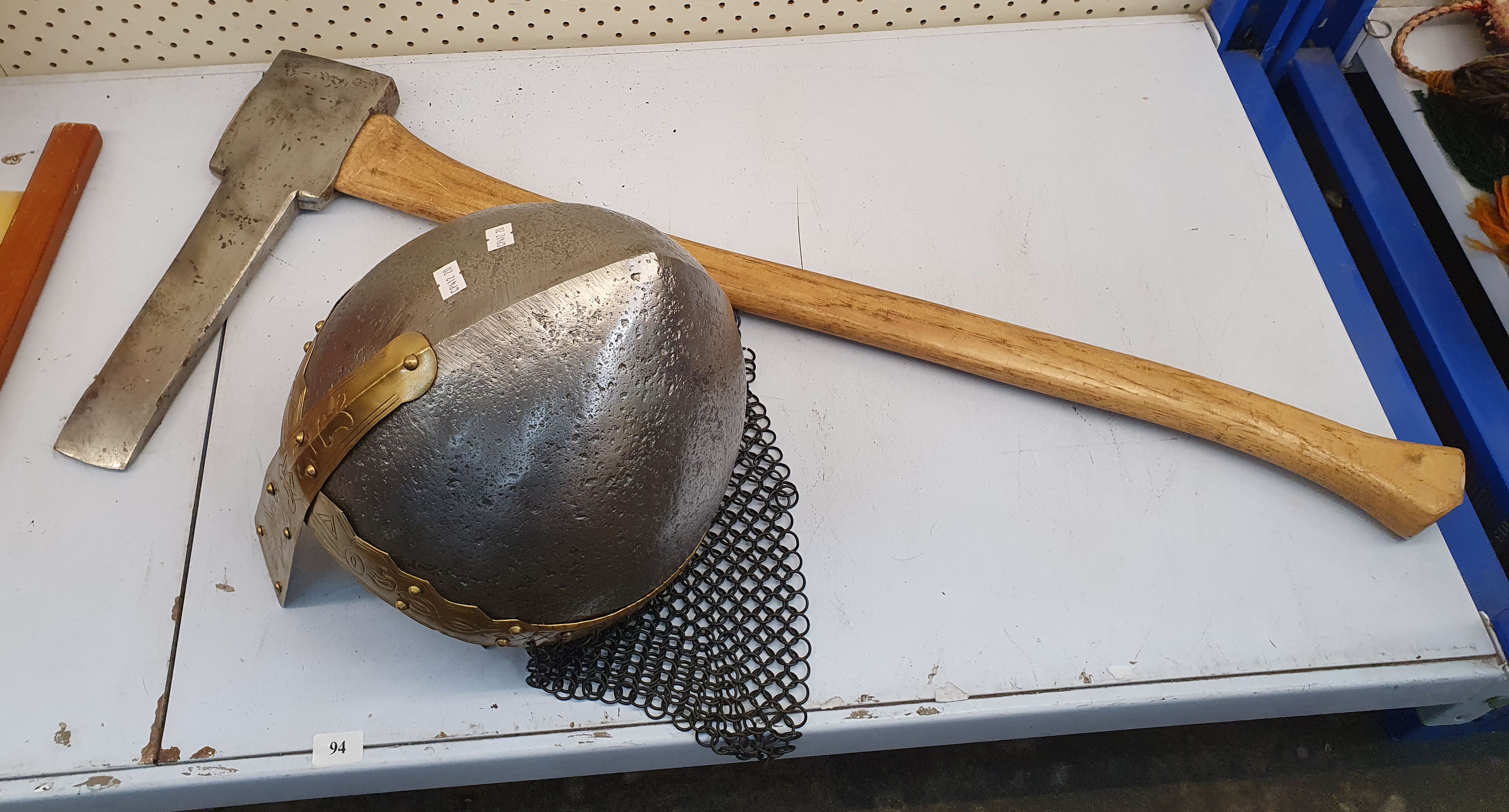 94 · A KNIGHTS AXE AND HELMET