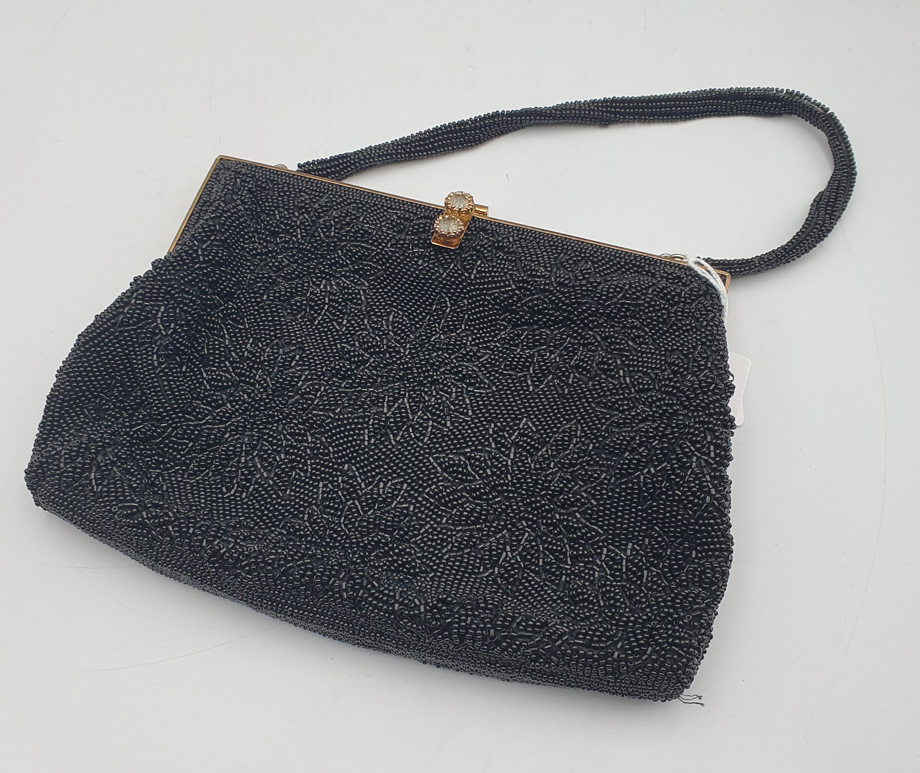 248 · A VINTAGE BEADWORK PURSE