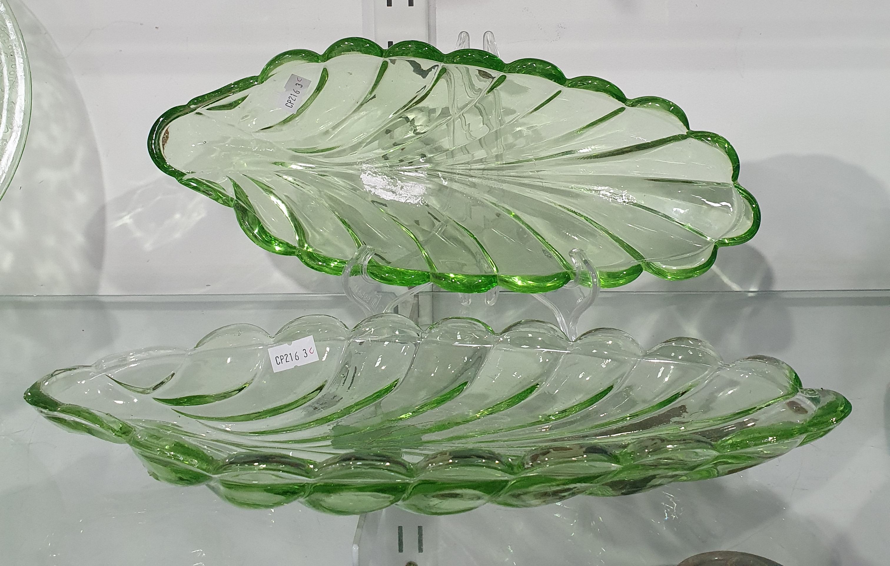 702 · A PAIR OF GREEN BAGLEY & CO