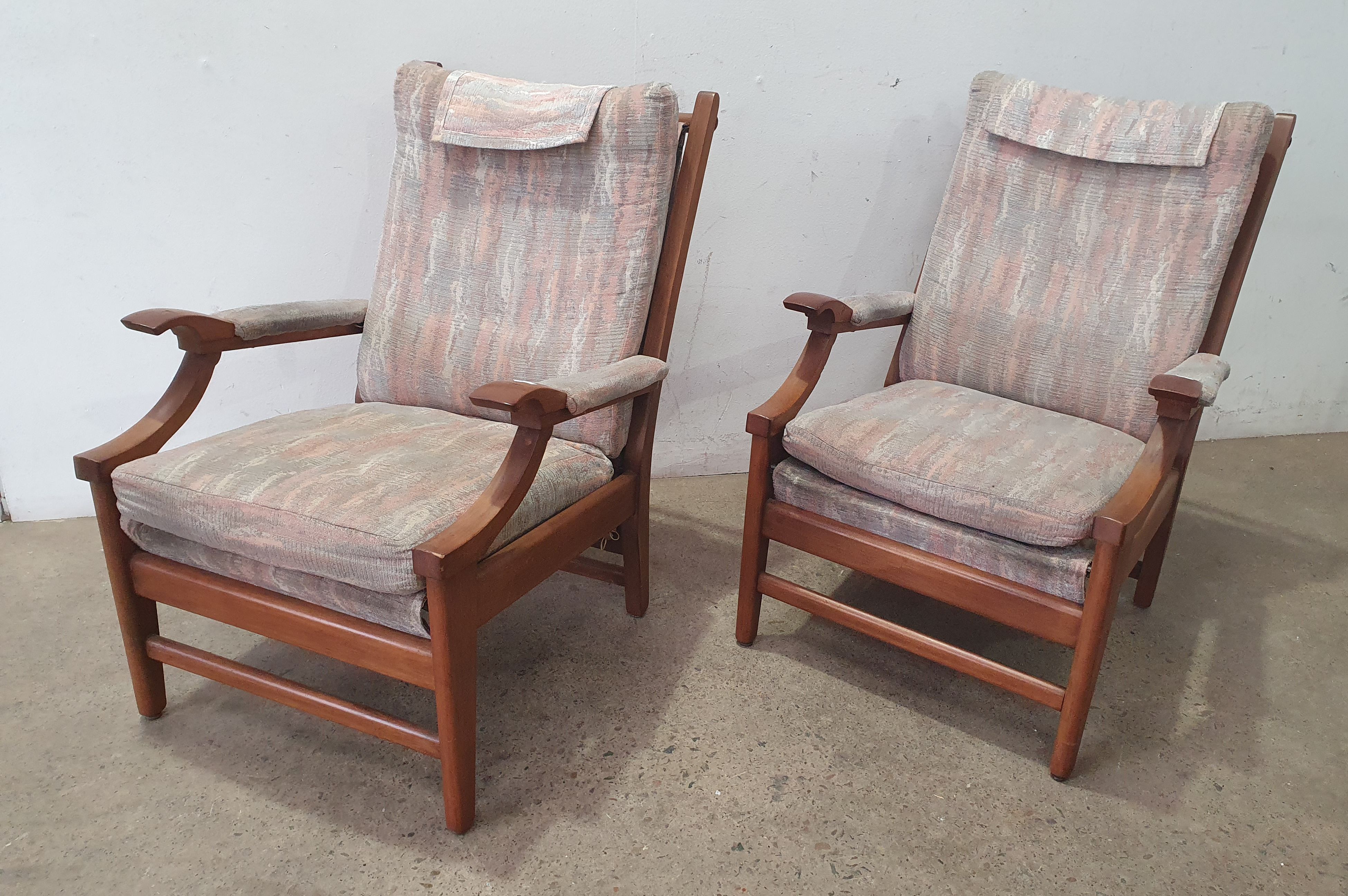 A Pair Of Parker Style Lounge Armchairs