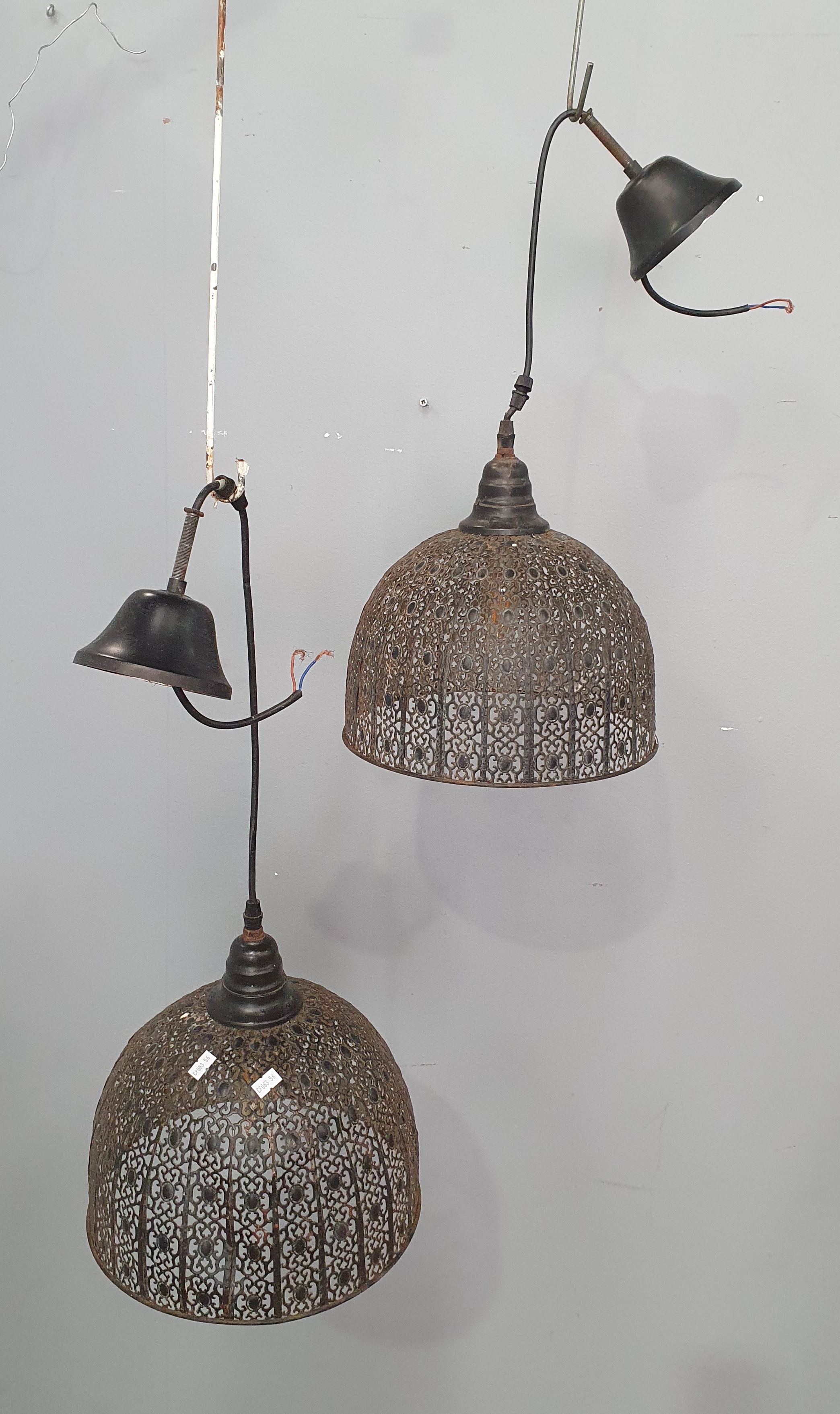 A Pair Of Metal Hanging Lights