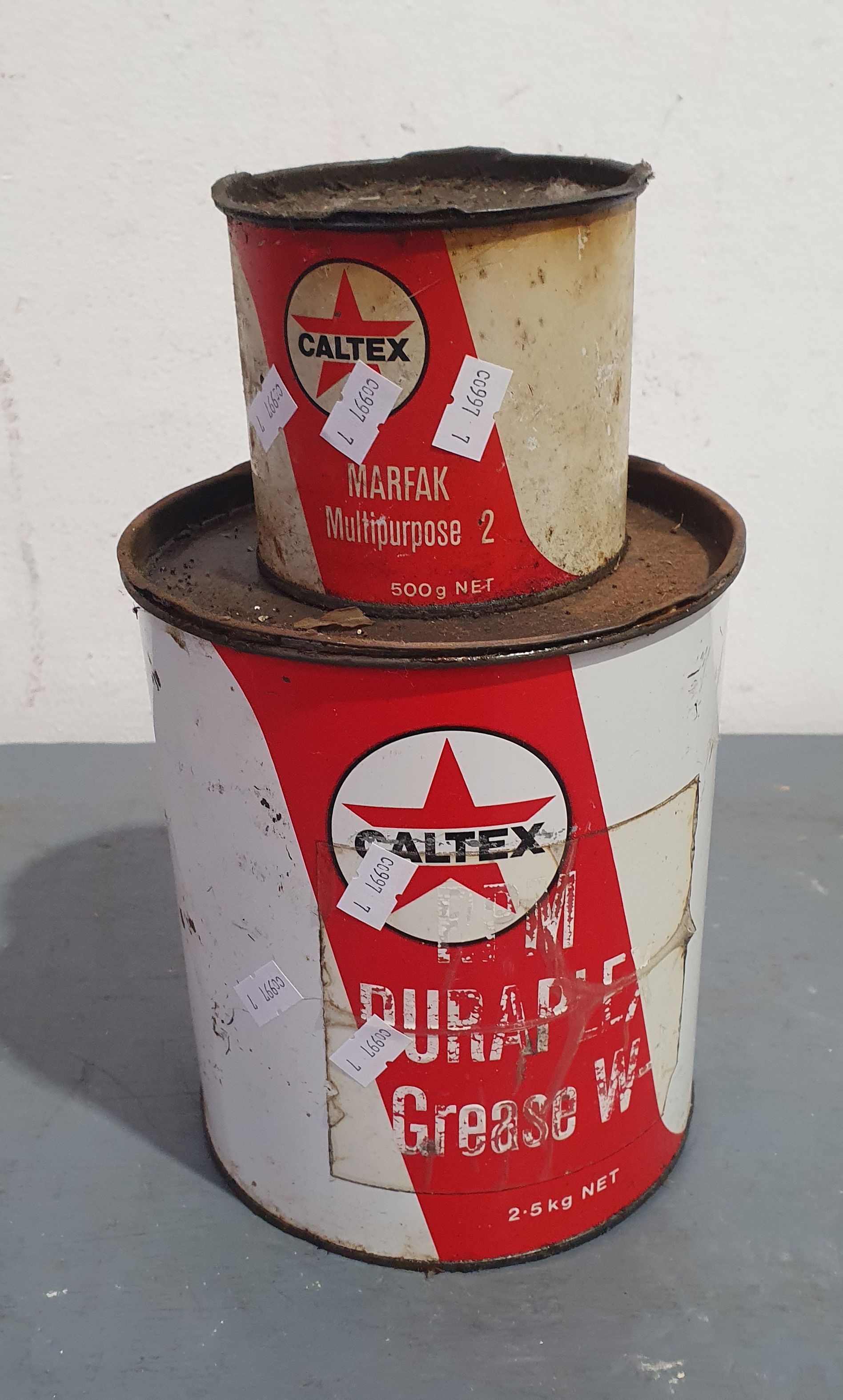 1252 · TWO CANS OF CALTEX CANS