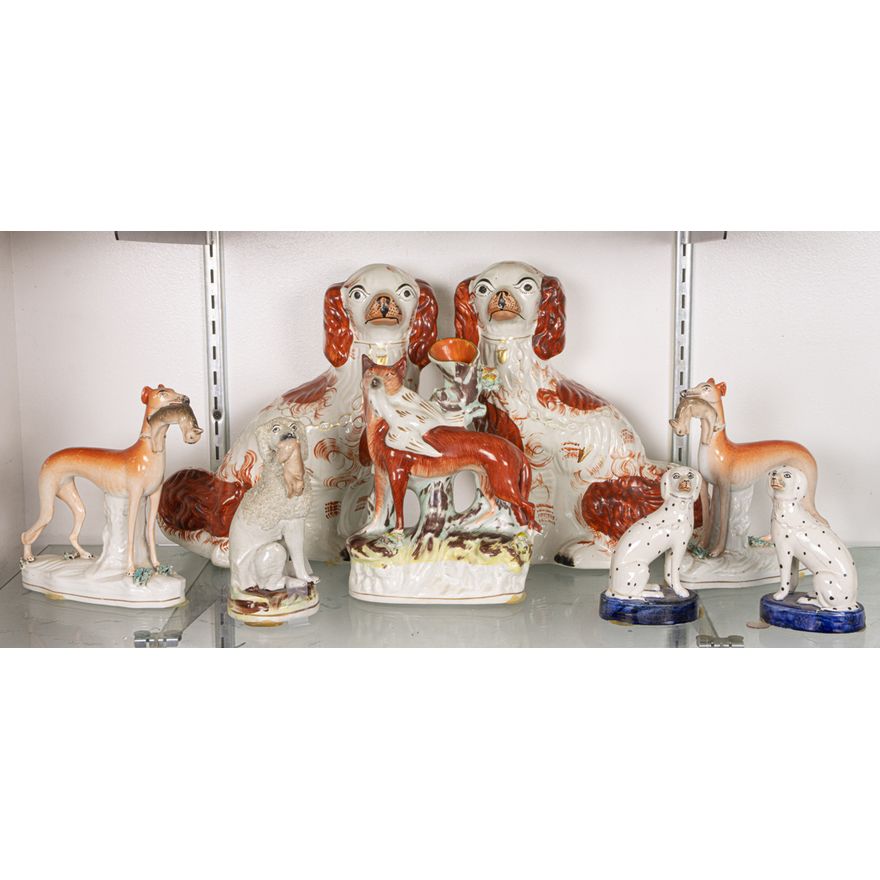 Eight Staffordshire pottery animals