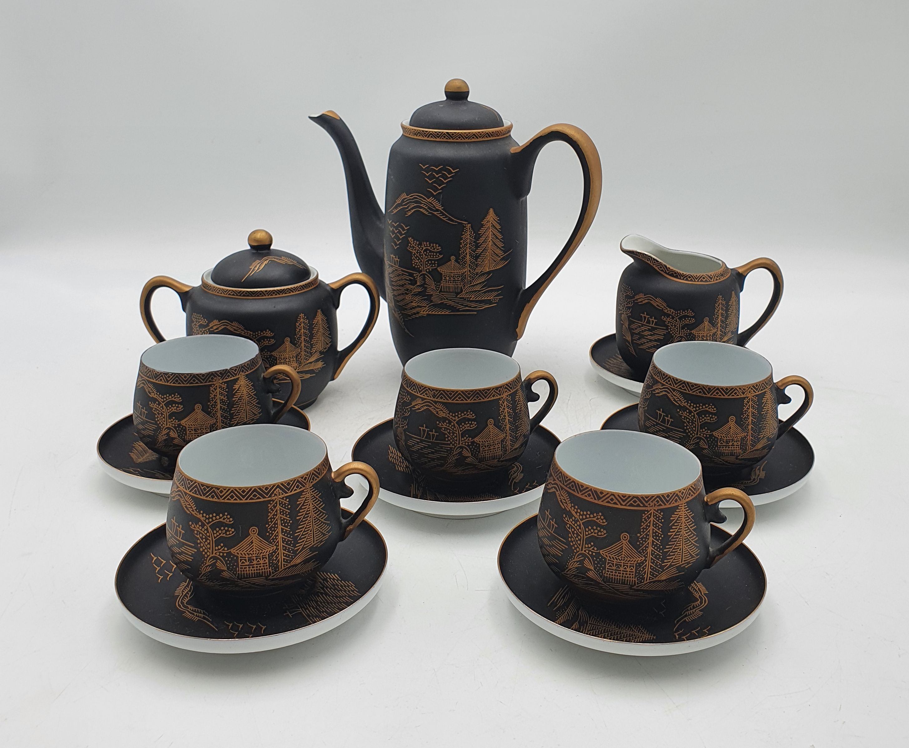 532 · A KUTANI CHINA LITHOPHANE PORCELAIN COFFEE SET