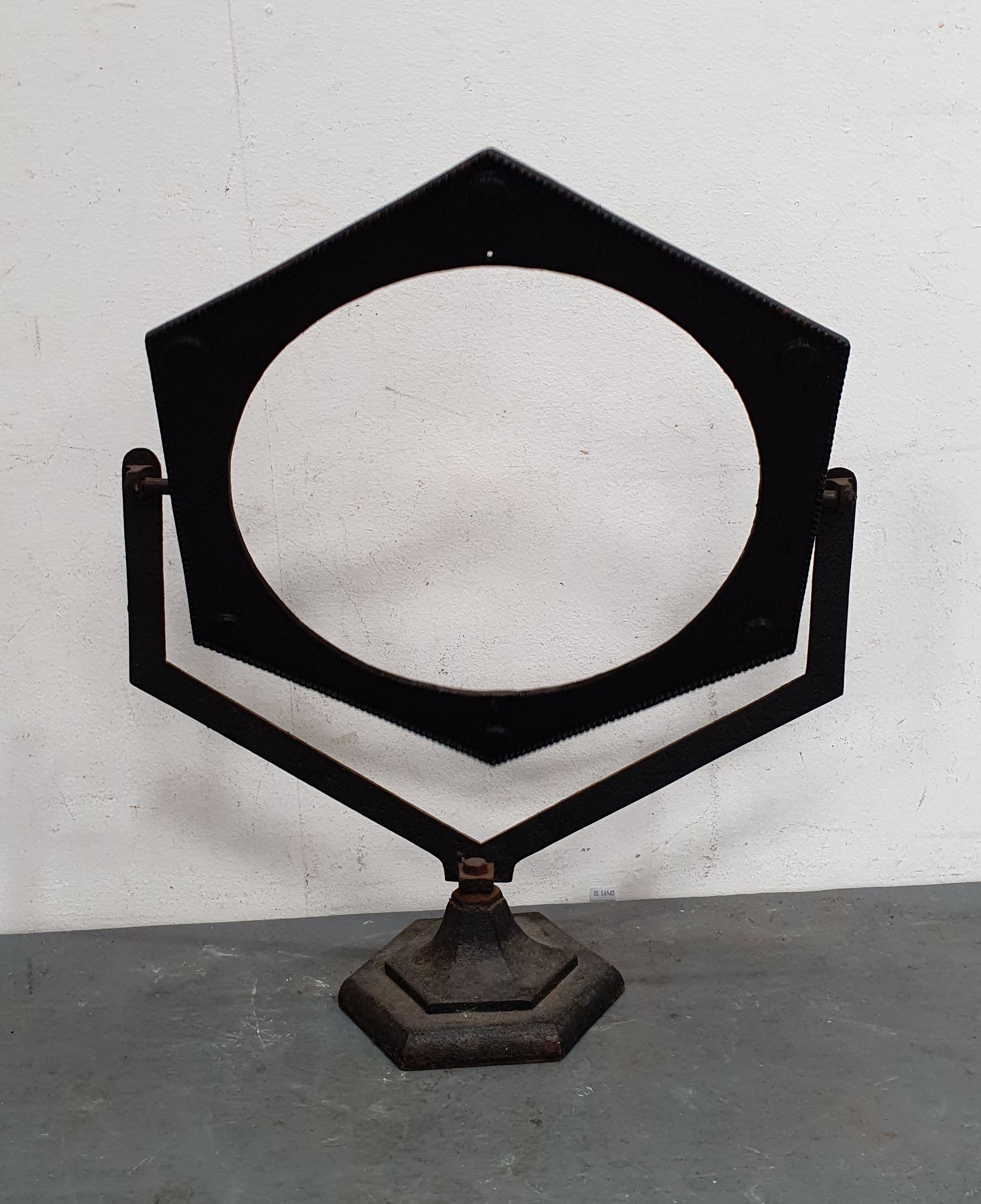 A CAST METAL MIRROR FRAME