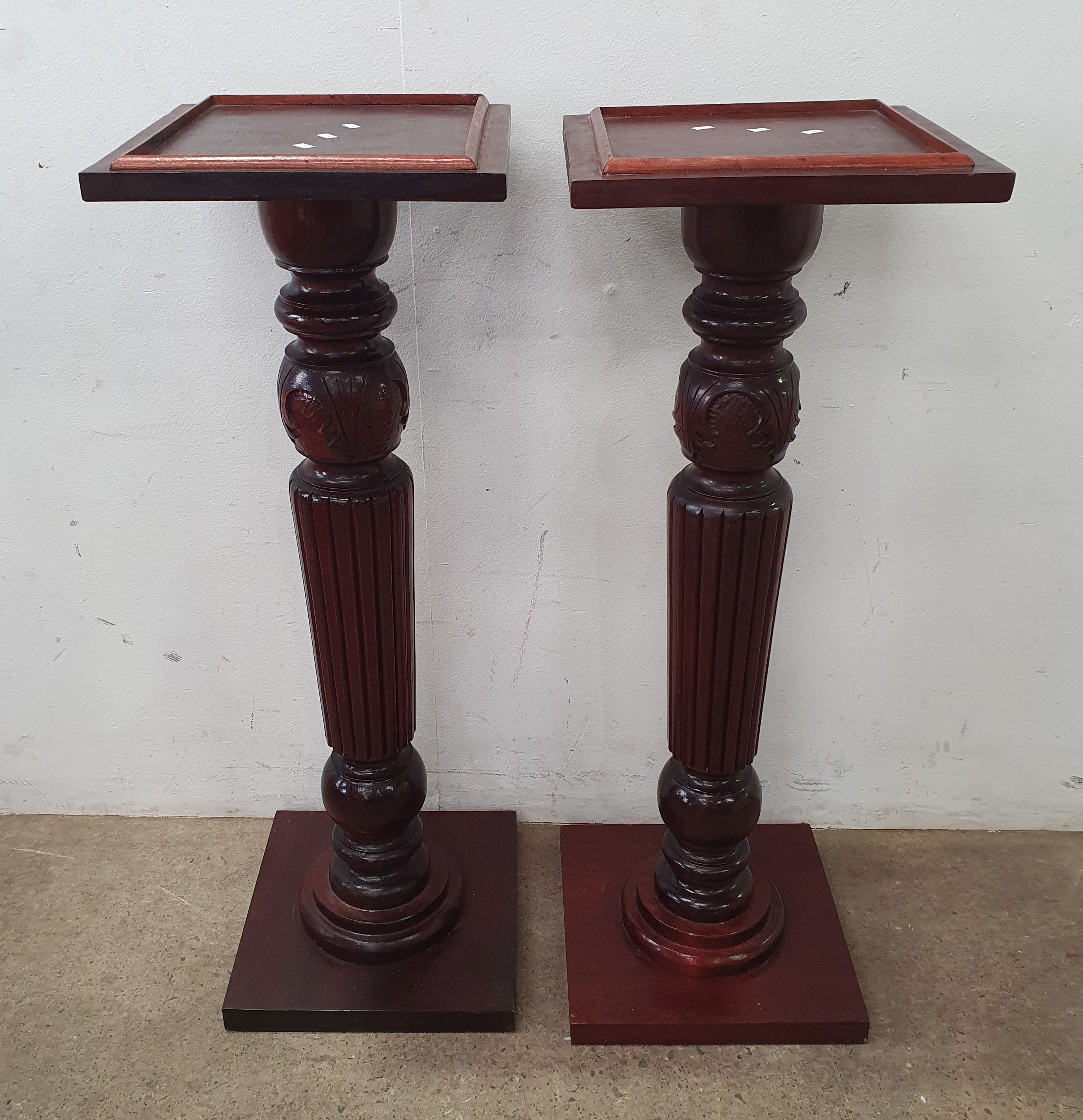 2001 · A PAIR OF COLUMN FORM PLINTHS