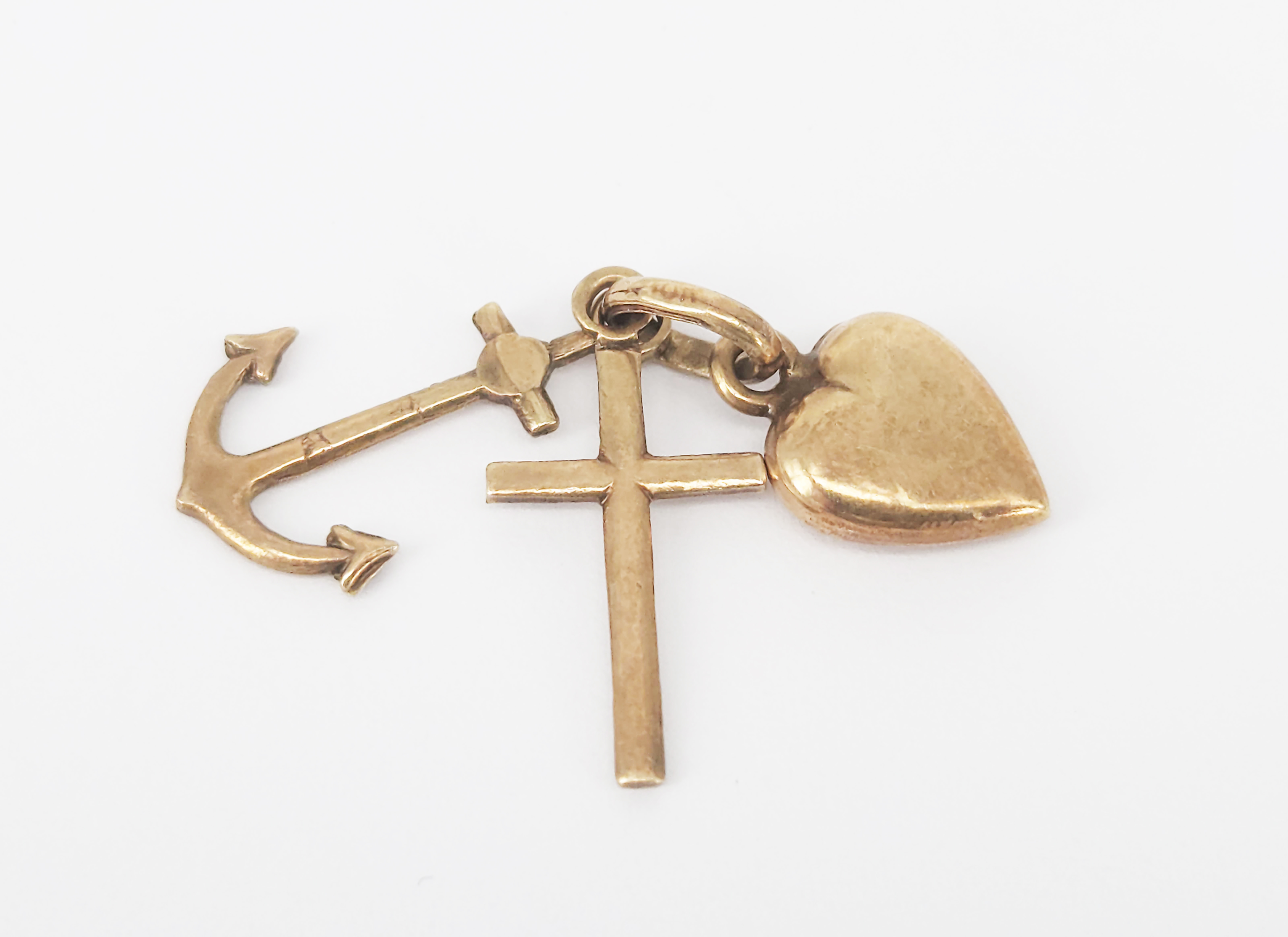422 · A 9ct ROSE GOLD CHARM