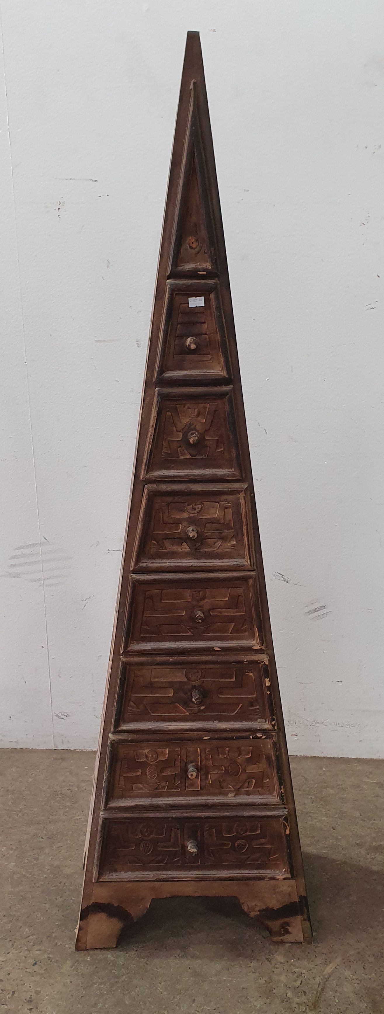 A Carved Pyramid Style Chest Of Drawers