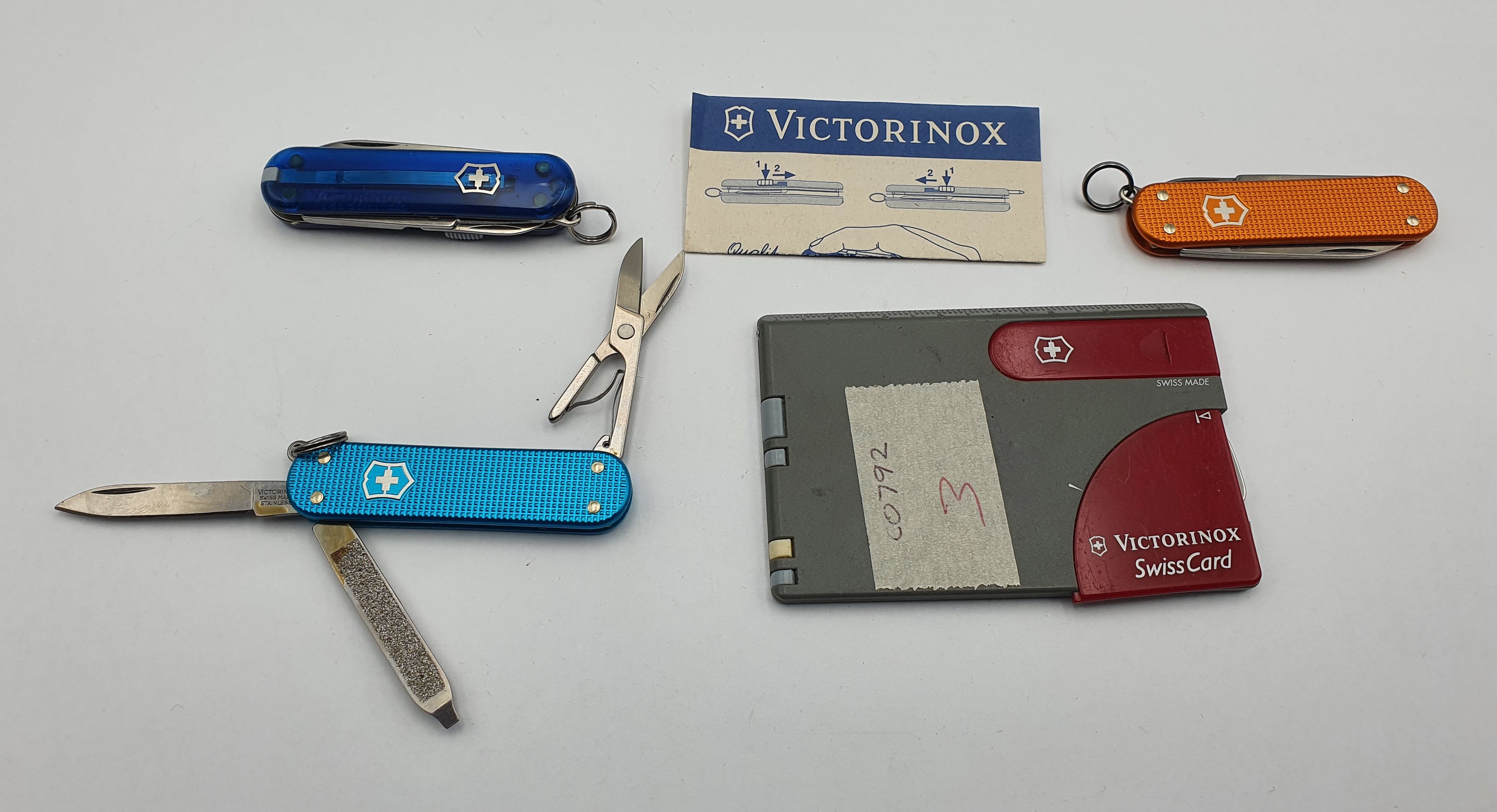 256 · FOUR VICTORINOX KNIVES