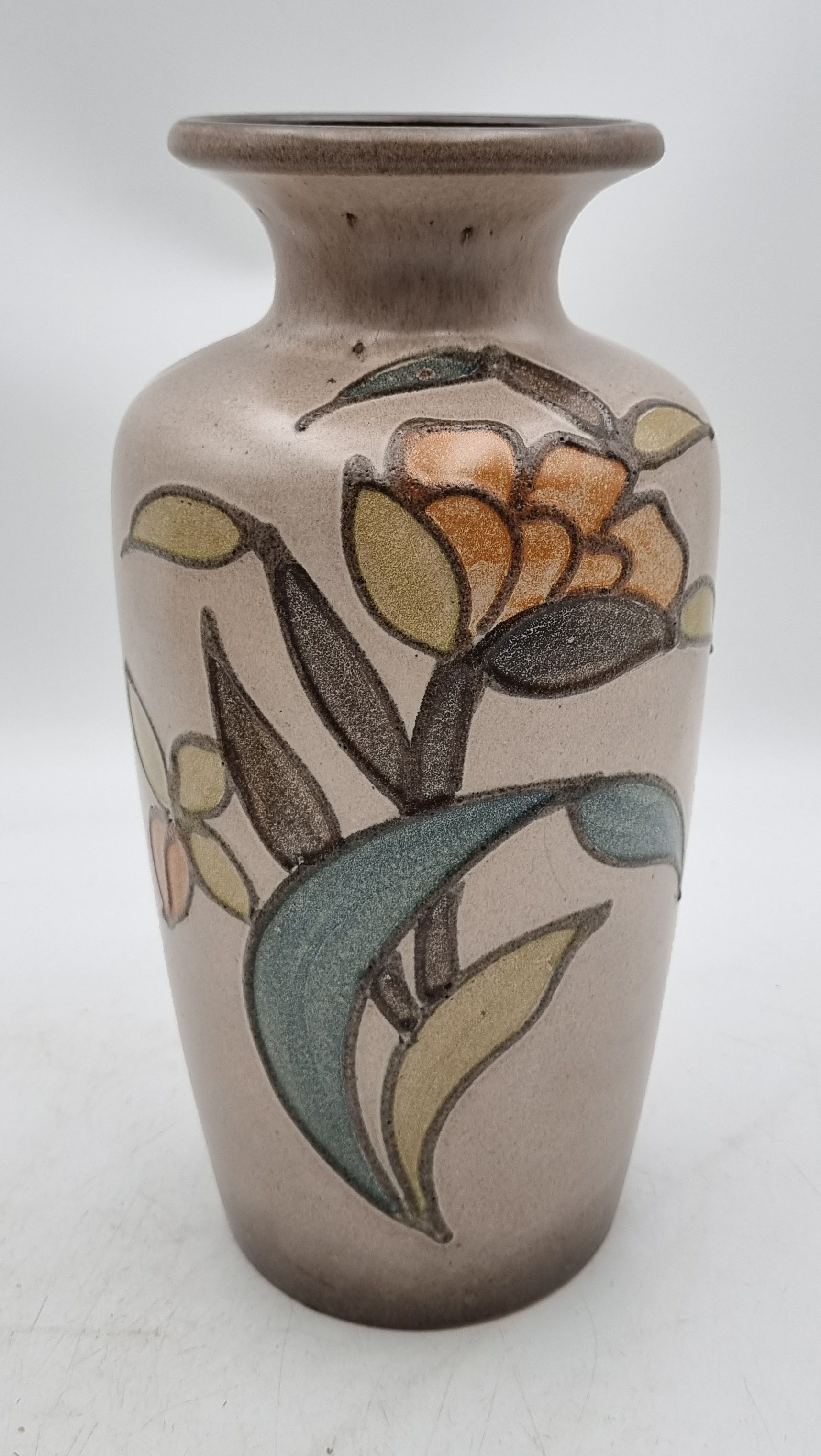79 · A WEST GERMAN POTTERY FLORAL MOTIF VASE