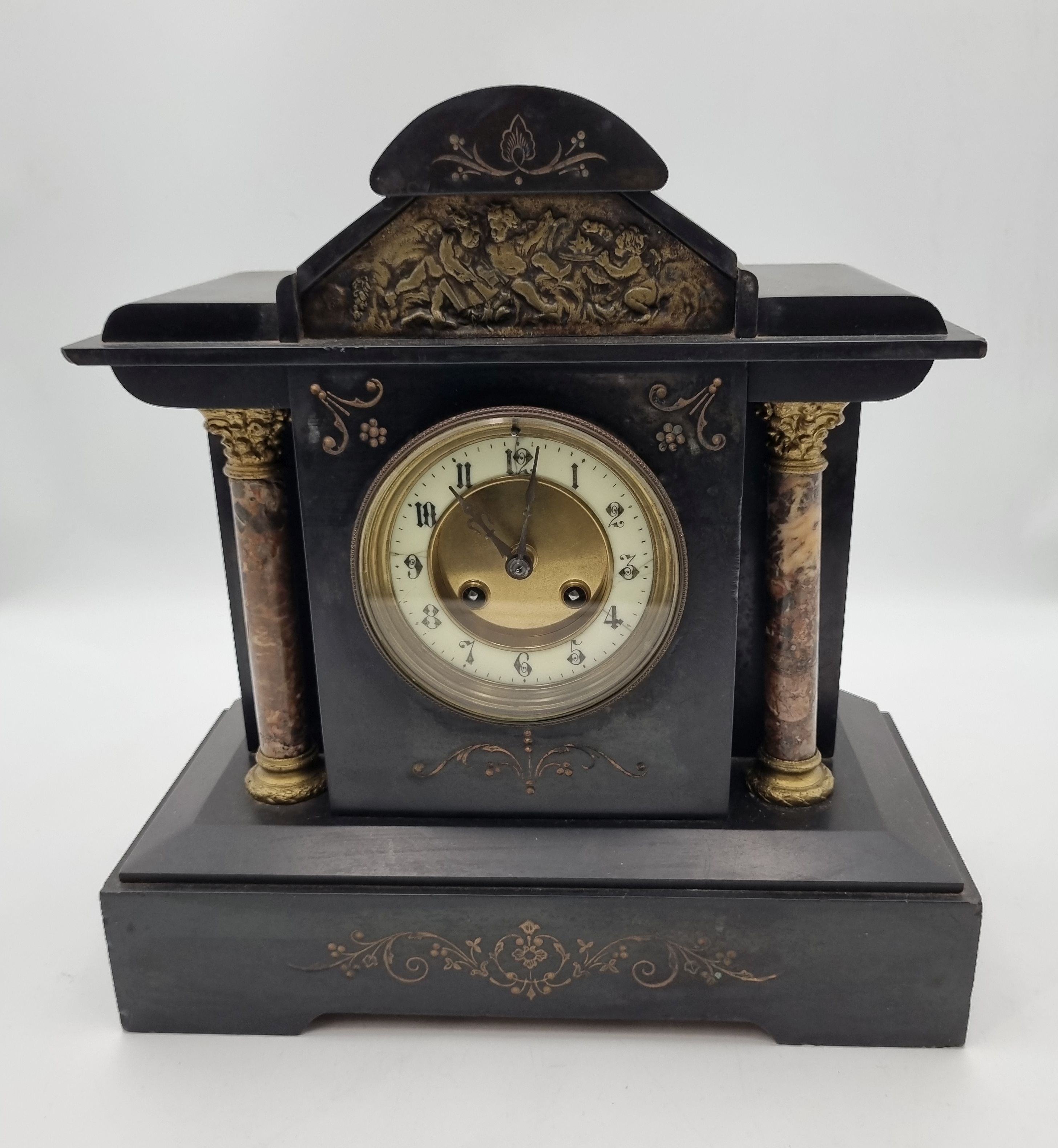 593 · A LATE 19TH CENTURY FRENCH BLACK SLATE MANTEL CLOCK
