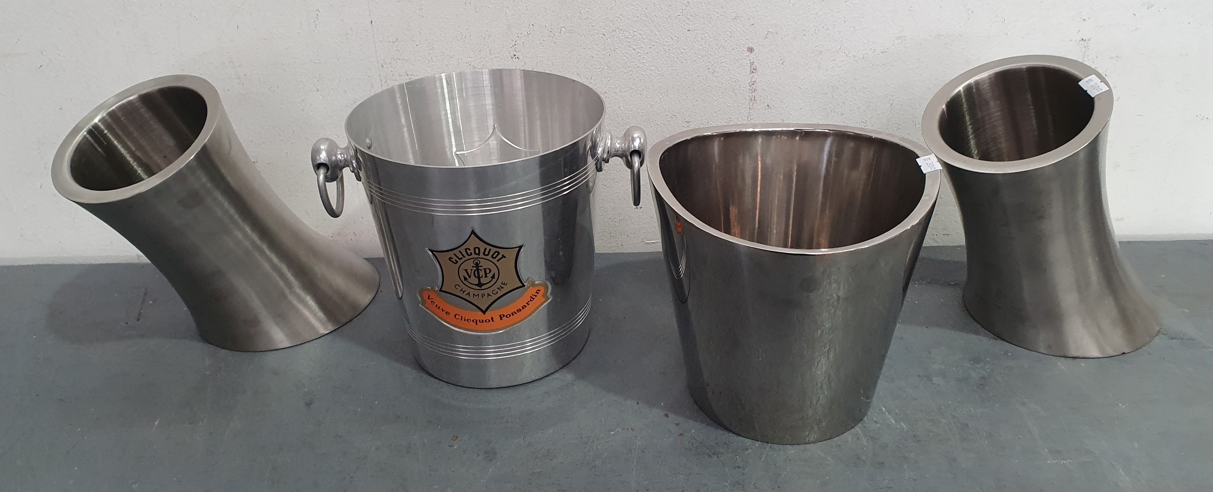 A Group Of Champaine Buckets