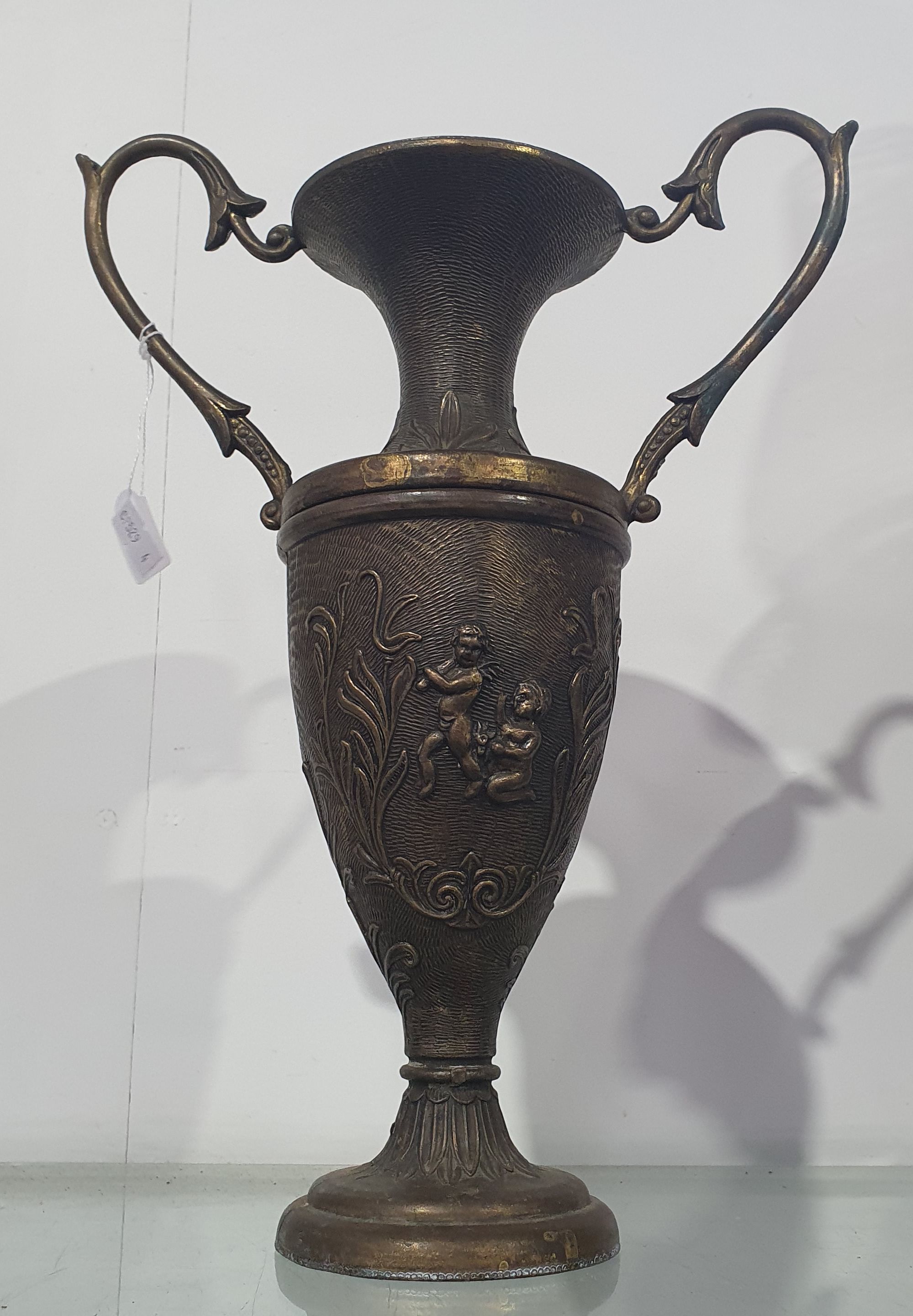 AN ART NOUVEAU STYLE BRASS VASE