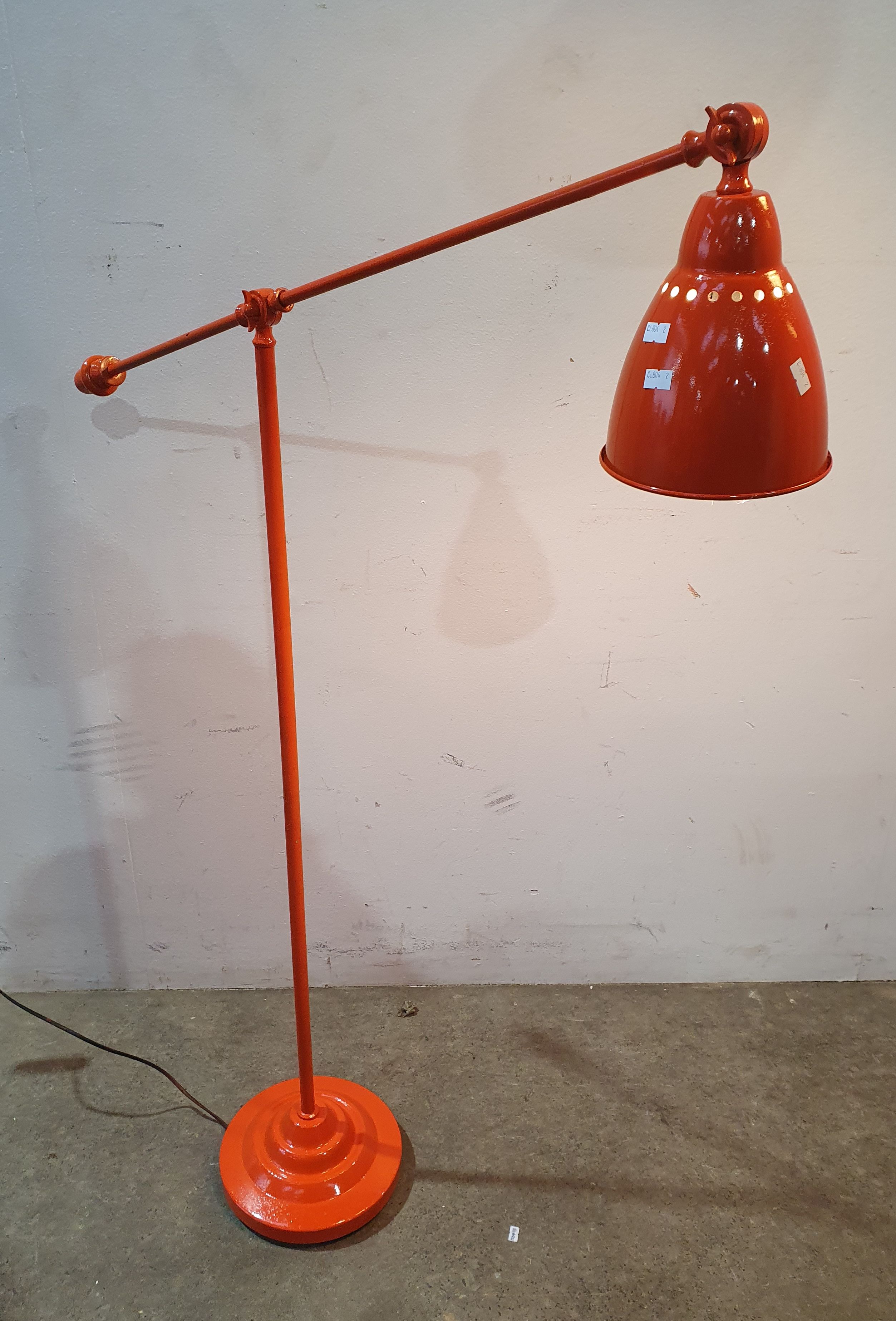 A Working Orange Standard Lamp