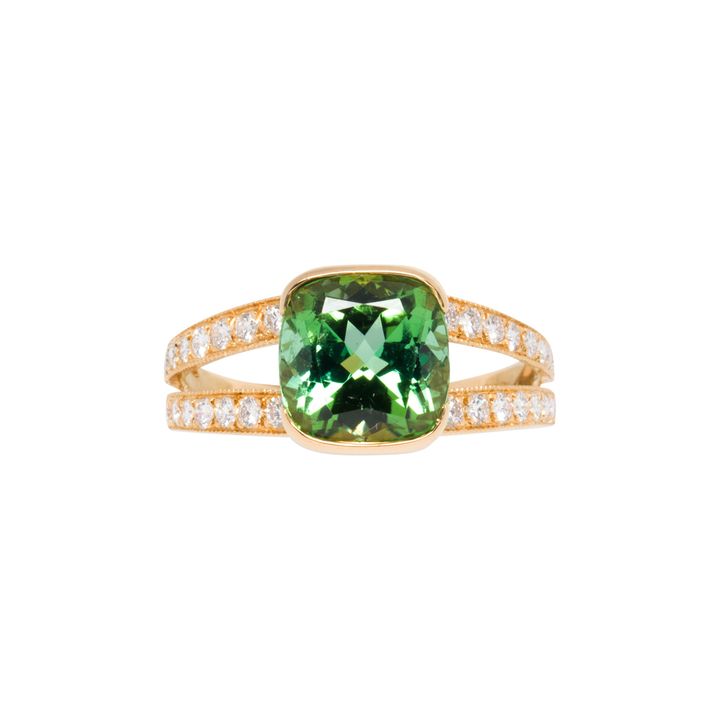 A peridot, pink sapphire, diamond and 18k gold ring