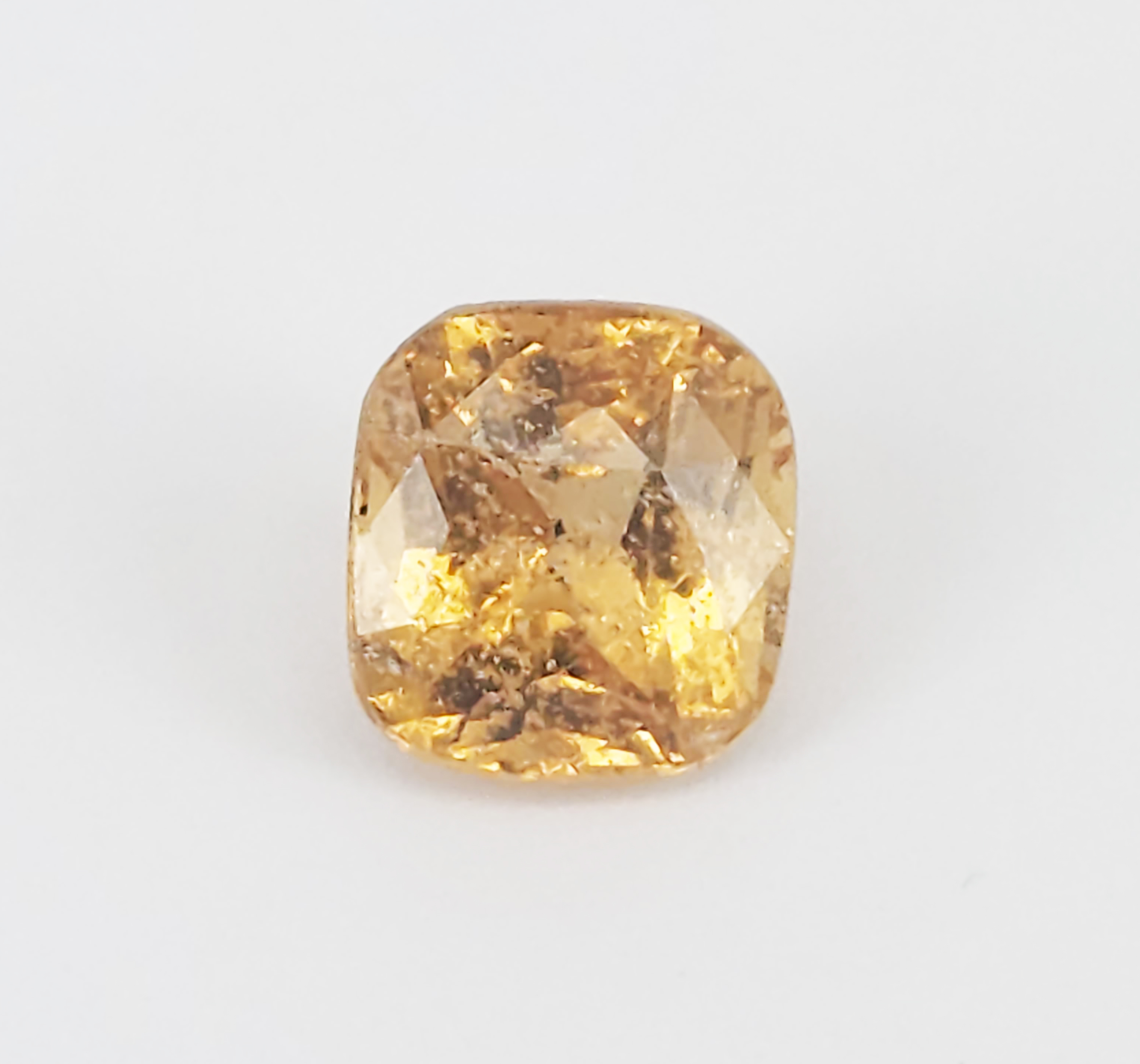 A Loose Cushion Cut Yellow Garnet