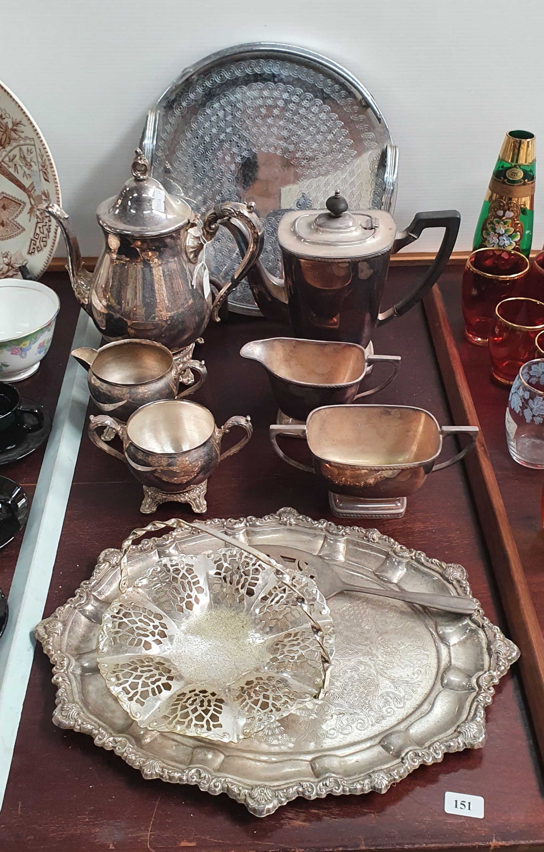 151 · A GROUP OF METAL SERVING WARE