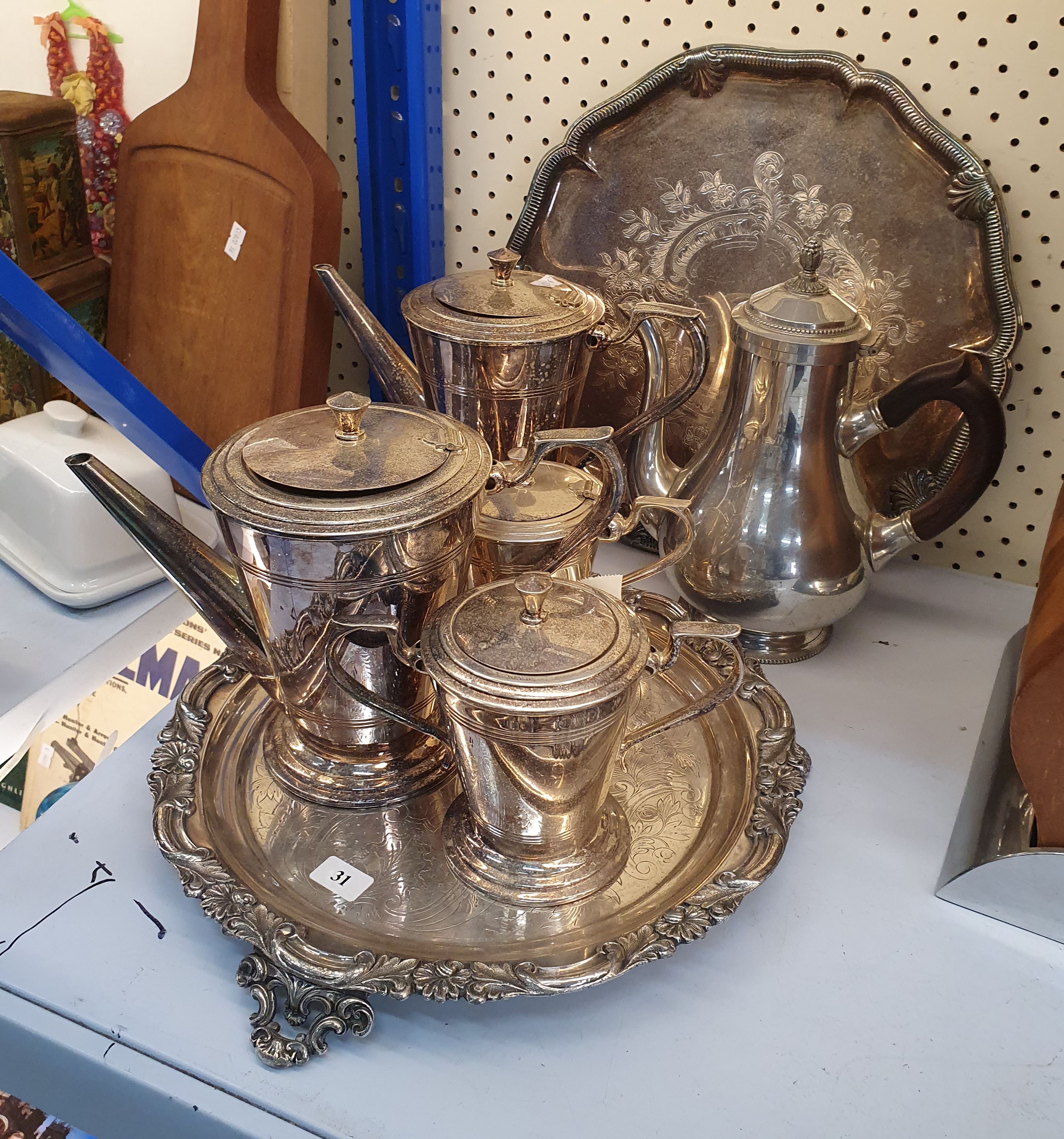 31 · A GROUP OF METAL SERVING WARE