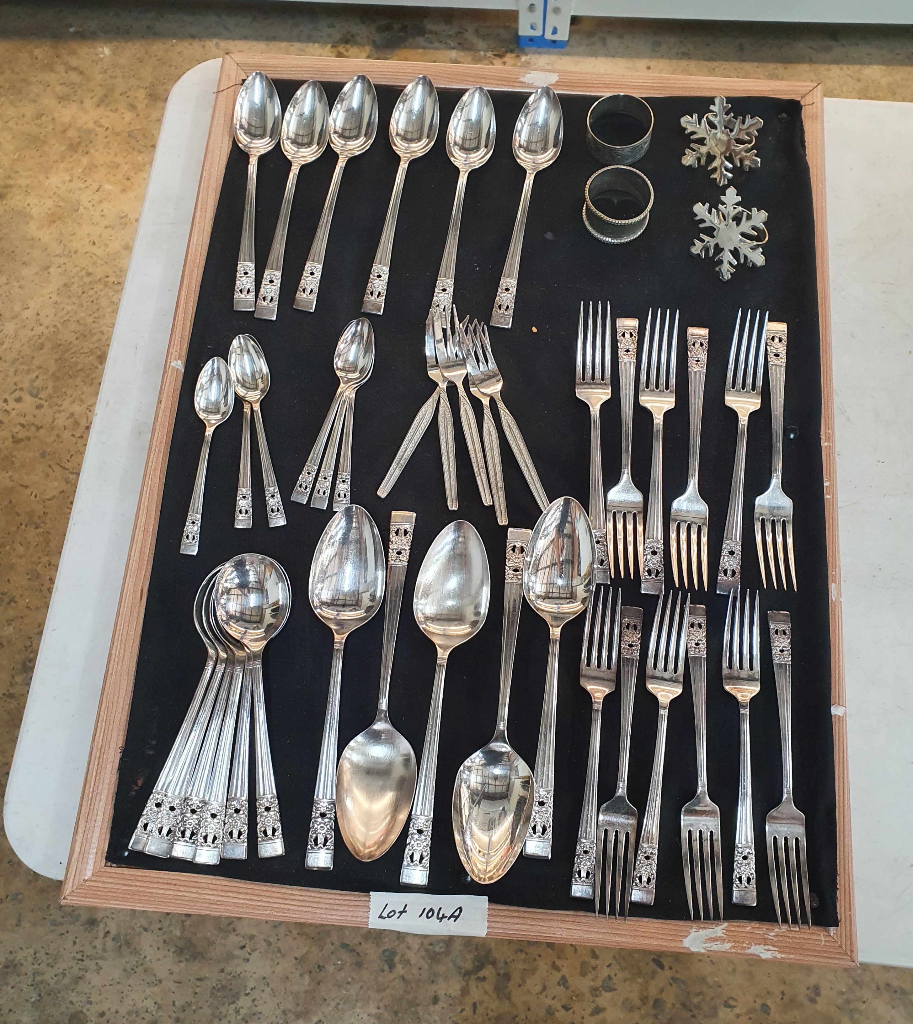 104A · A GROUP OF CUTLERY