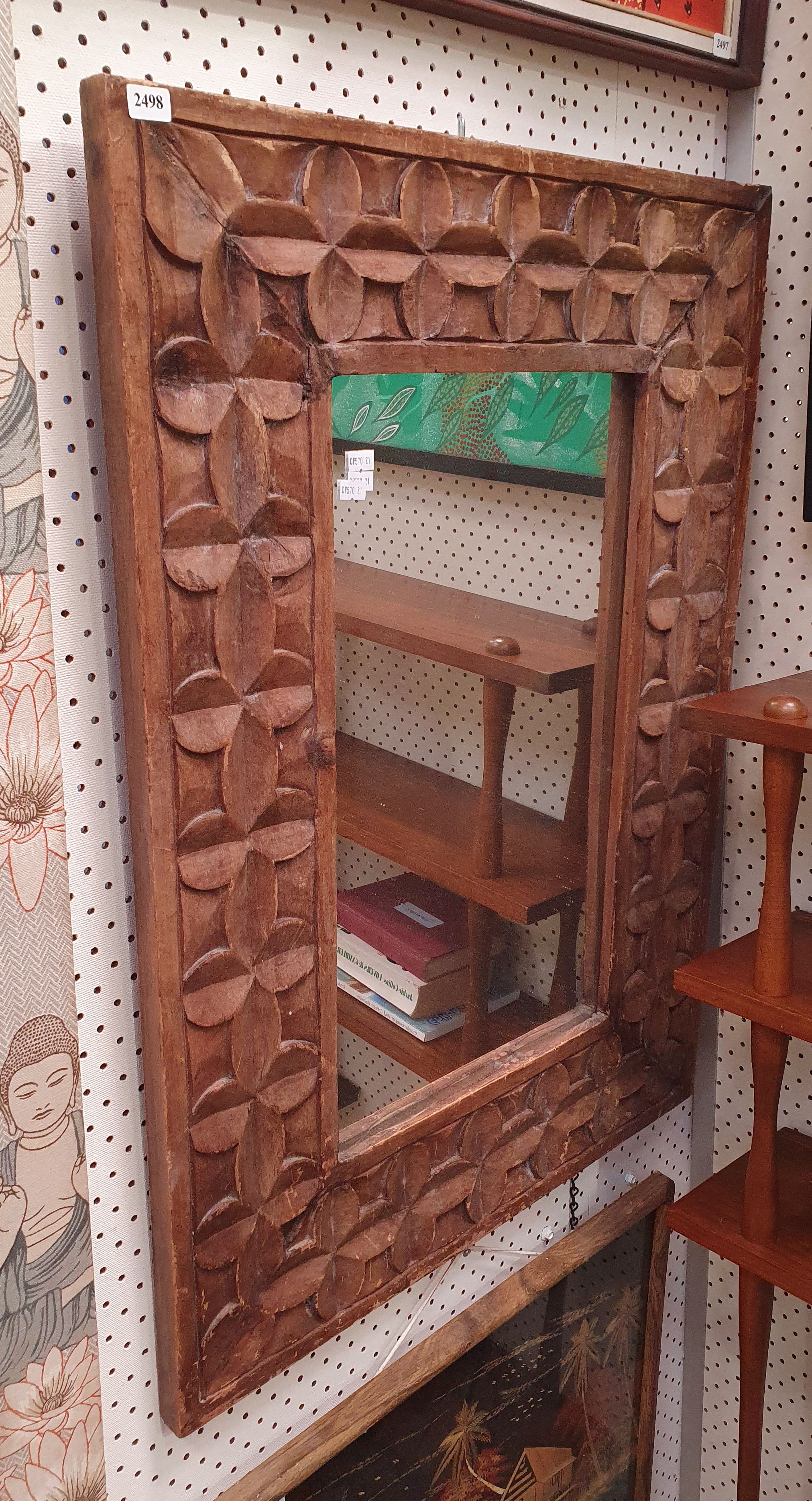 A WOODEN FRAME MIRROR